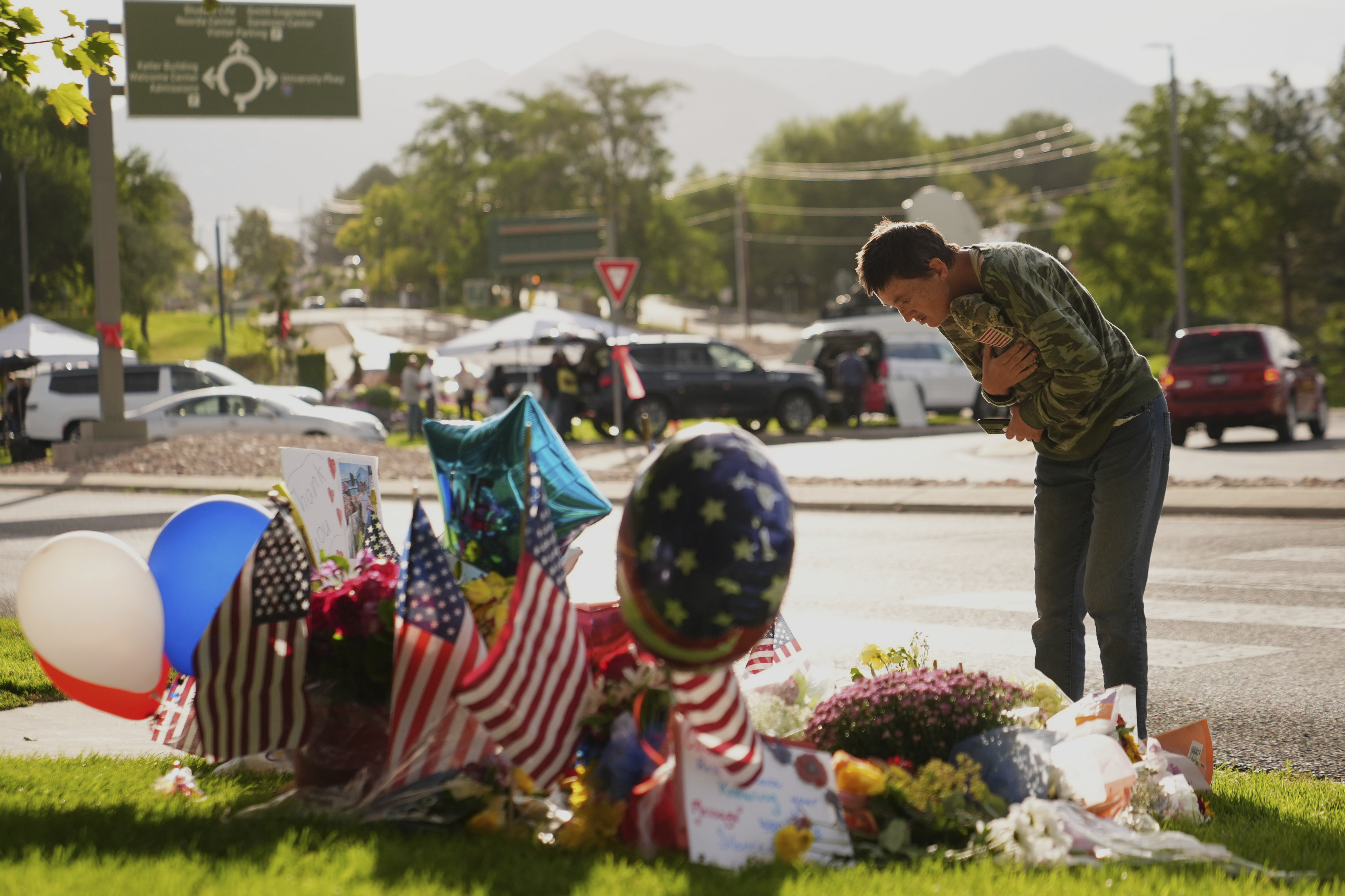 Wendy Lucas, Utah Valley University student looks at a memorial set up for Charlie Kirk at Utah Valley University in Orem, Utah, Friday, Sept. 12, 2025. (Lindsey Wasson - AP)