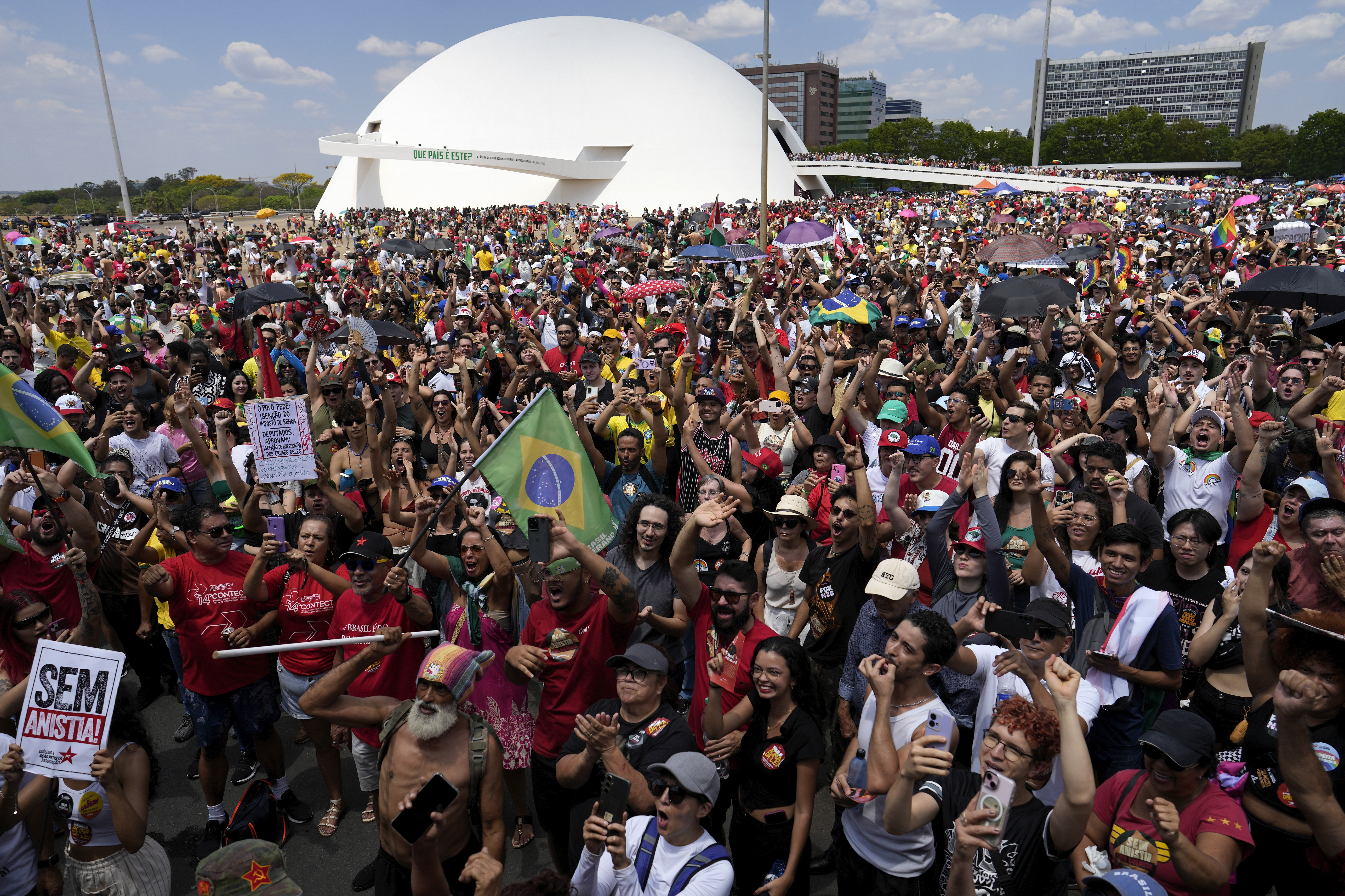 Demonstrators protest an amnesty bill that could benefit former President Jair Bolsonaro and his allies convicted for a 2023 coup attempt, in Brasilia, Brazil, Sunday, Sept. 21, 2025. (Eraldo Peres - AP)