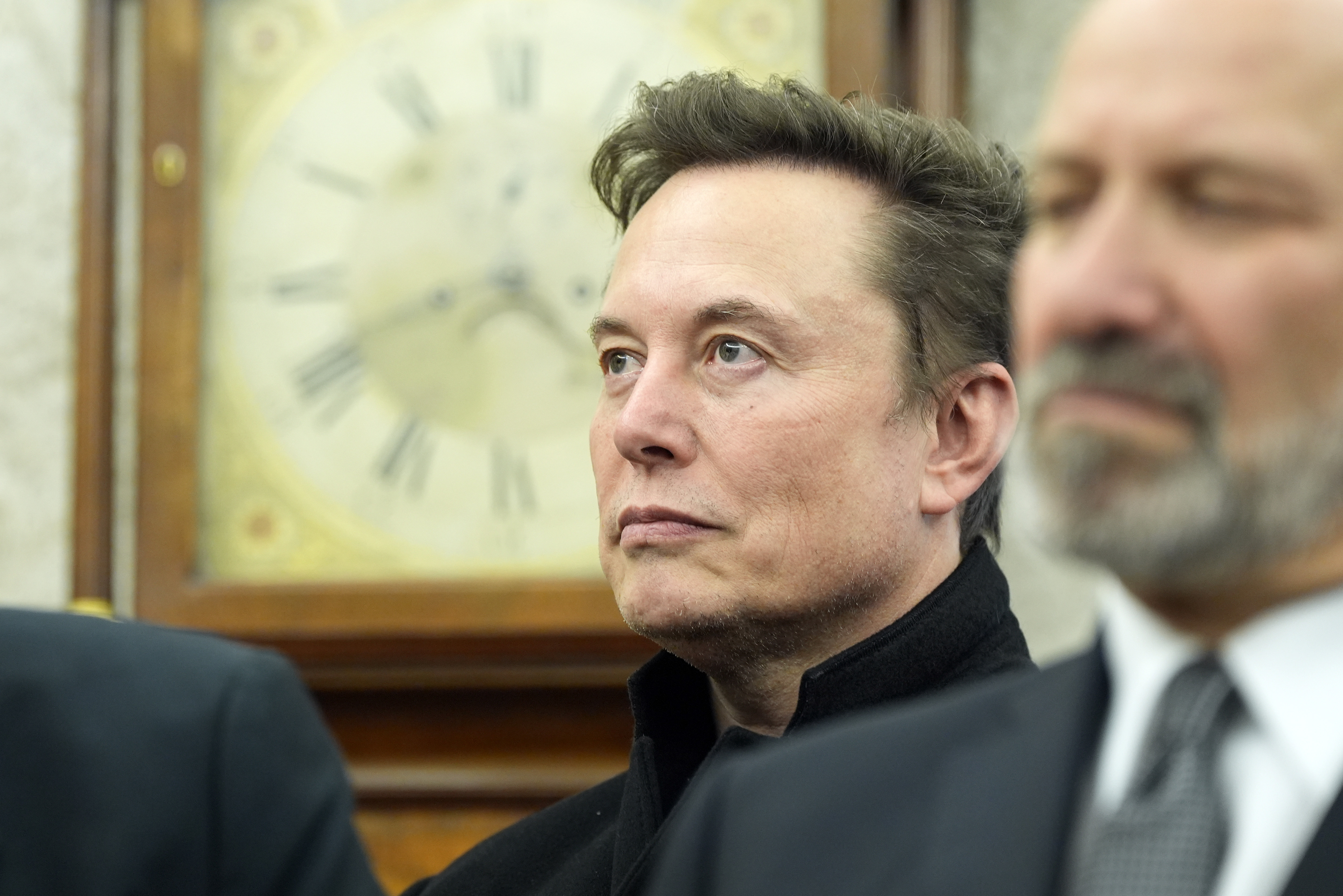 FILE - Elon Musk listens as President Donald Trump meets with India's Prime Minister Narendra Modi in the Oval Office of the White House, Feb. 13, 2025, in Washington. (Alex Brandon - AP)