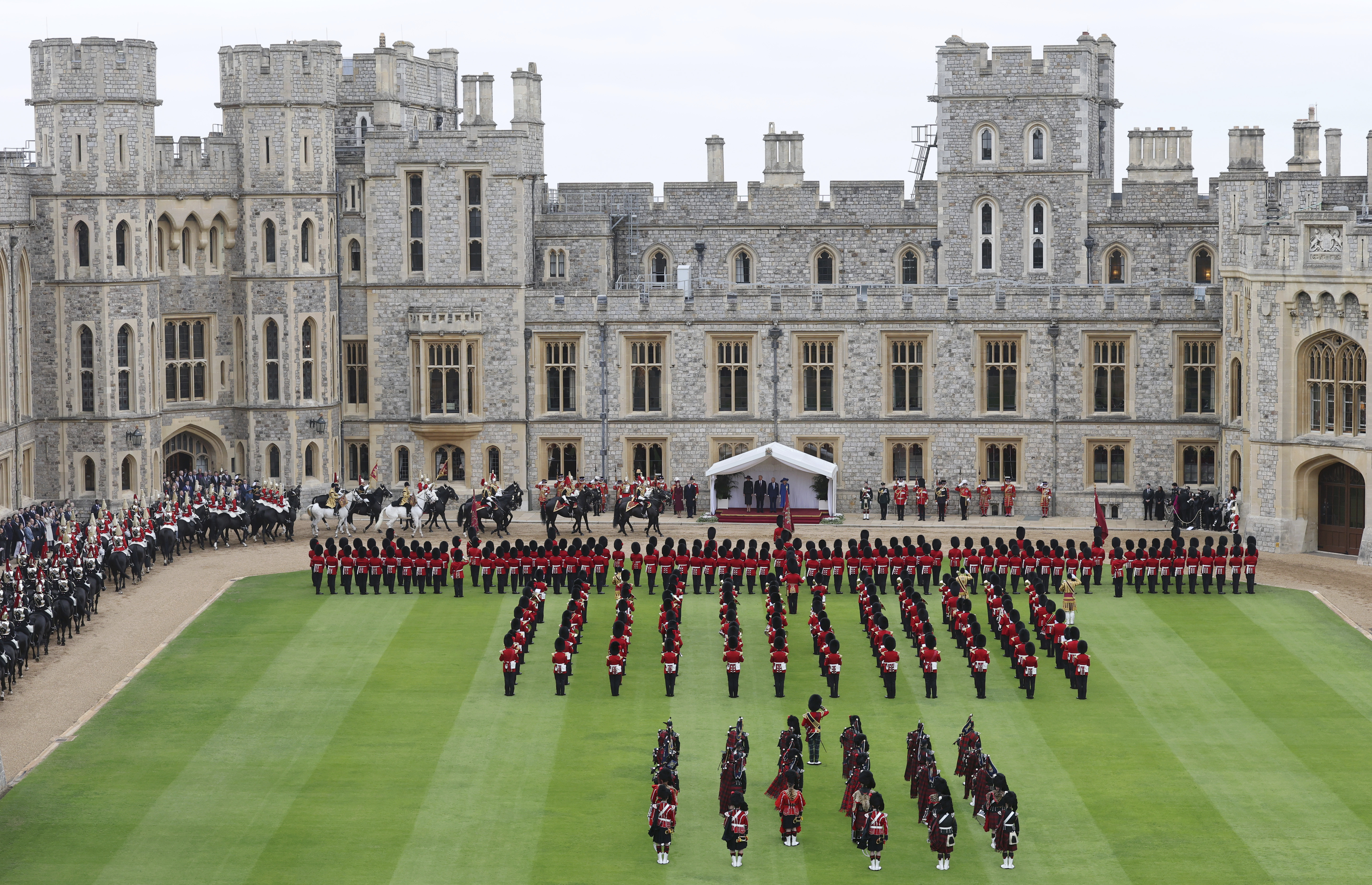 Britain's Kate, Princess of Wales, Prince William, first lady Melania Trump, President Donald Trump, Britain's King Charles III and Queen Camilla review the Guard of Honour at Windsor Castle in Windsor, England, Wednesday Sept. 17, 2025. (Chris Jackson - Pool Getty Images)