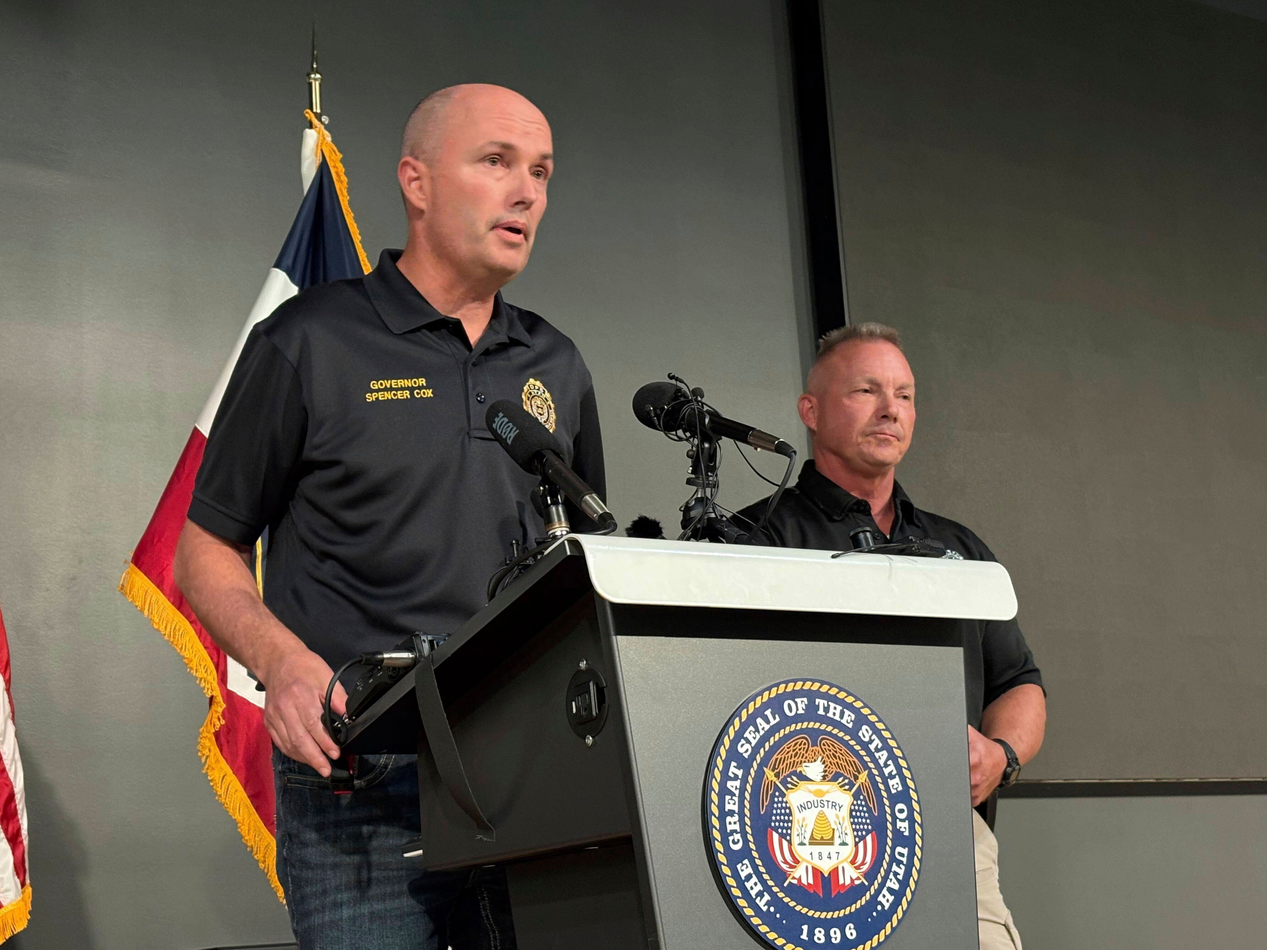 Utah Gov. Spencer Cox, left, speaks with Utah Valley University Chief of Police Jeff Long, right, at a press conference at the Keller Building on the Utah Valley University campus after Charlie Kirk was shot and died during Turning Point's visit to the university, Wednesday, Sept. 10, 2025, in Orem, Utah. (Hannah Schoenbaum - AP)