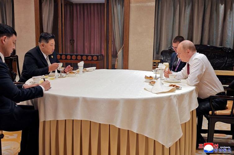 North Korean leader Kim Jong Un meets Russian President Vladimir Putin in Beijing