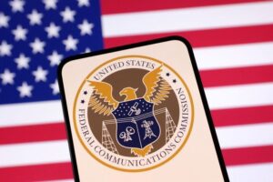 Illustration shows United States Federal Communications Commision logo and U.S. flag