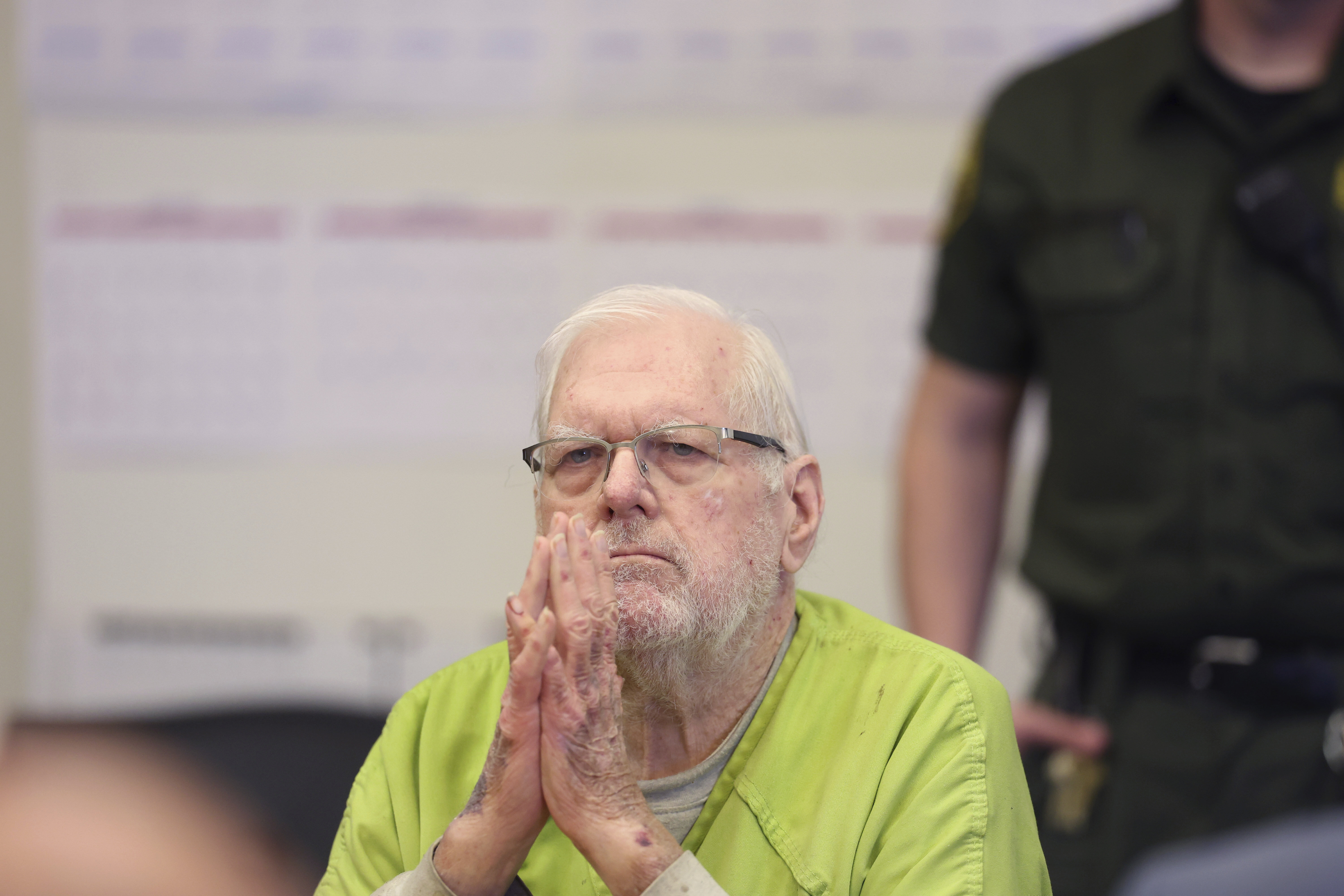 Orange County Superior Court Judge Jeffrey Ferguson reacts as he listens to victim impact statements while appearing for sentencing after his second-degree murder conviction for shooting his wife following an hours-long argument at the Central Justice Center in Santa Ana, Calif., Wednesday, Sept. 17, 2025. (Allen J. Schaben - Pool Los Angeles Times)