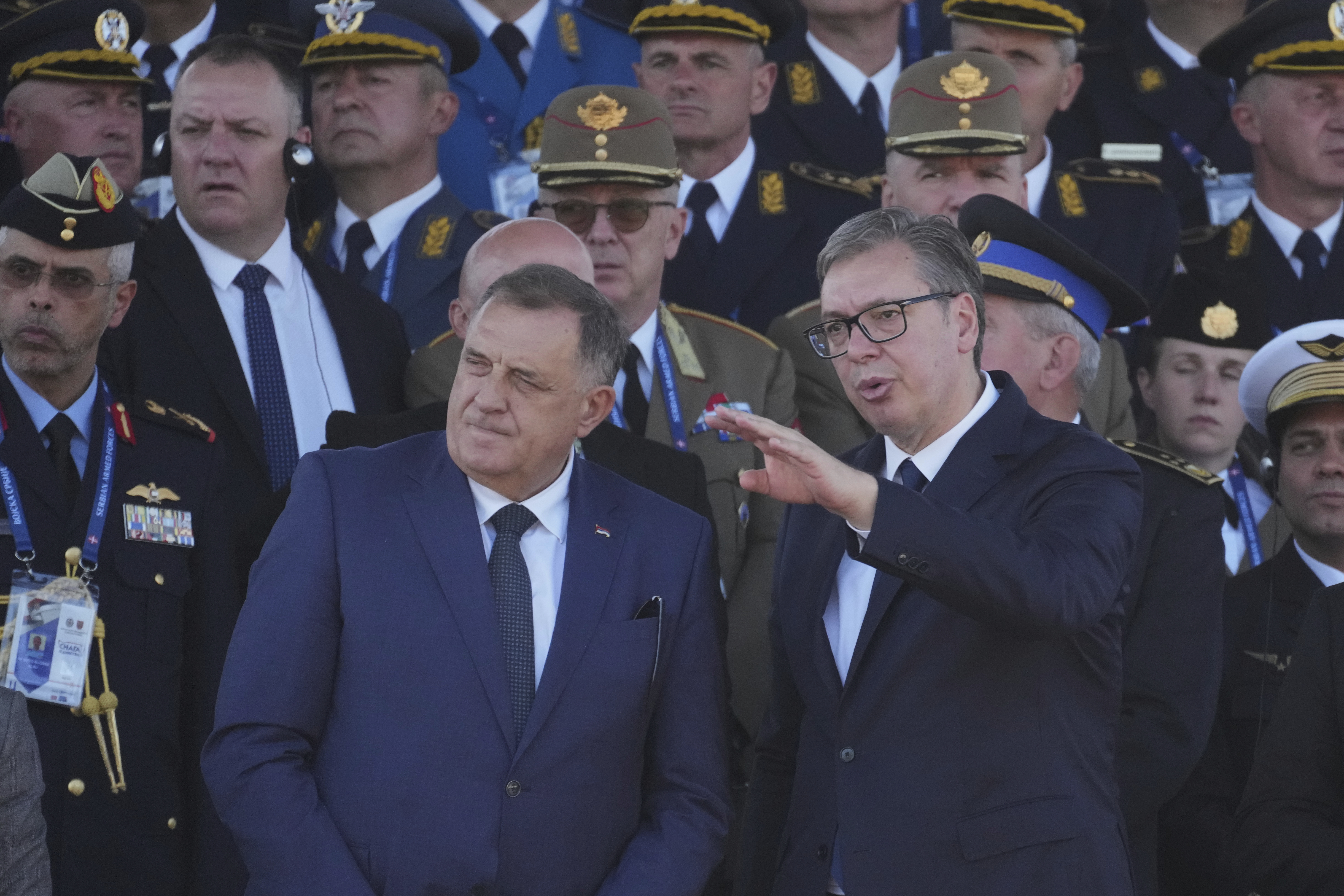 Serbian President Aleksandar Vucic, right, and Bosnian Serb leader Milorad Dodik attend a military parade in Belgrade, Serbia, Saturday, Sept. 20, 2025. (Darko Vojinovic - AP)