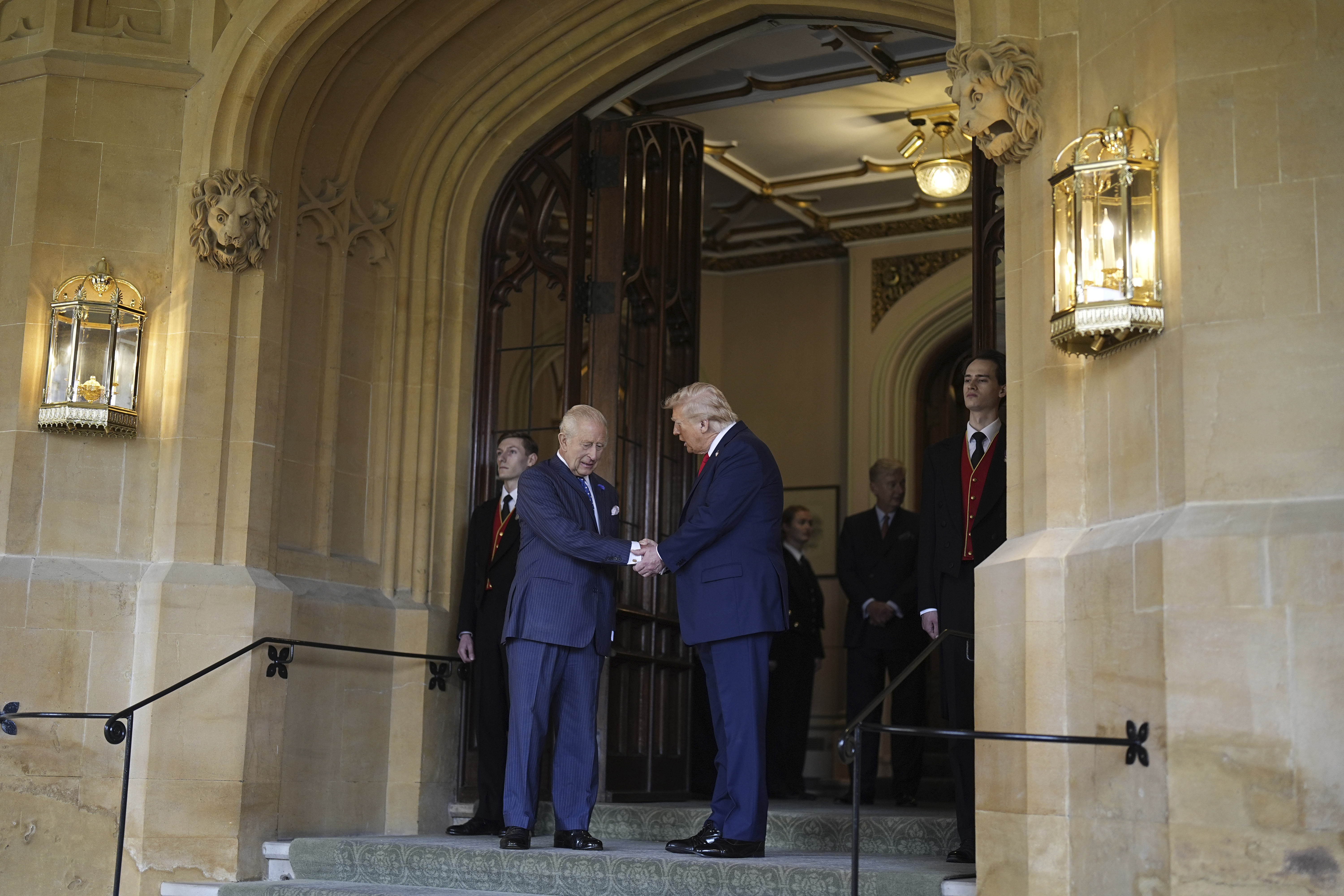 Britain's King Charles III, left, formally bids farewell to US President Donald Trump at Windsor Castle, Windsor, England, Thursday Sept. 18, 2025. (Aaron Chown - PA Pool)