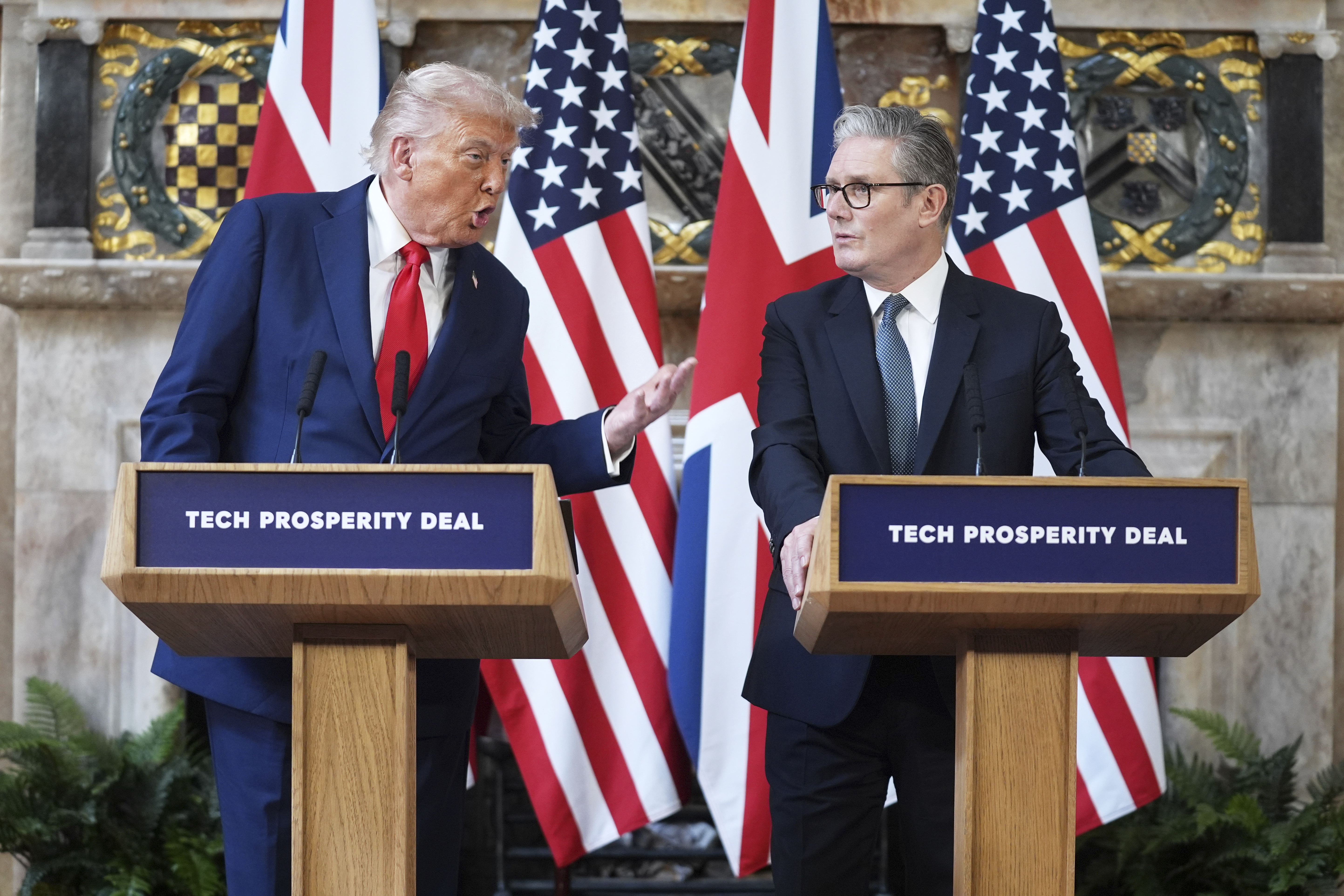 President Donald Trump gestures next to Britain's Prime Minister Keir Starmer during a joint press conference at Chequers near Aylesbury, England, Thursday, Sept. 18, 2025. (Evan Vucci - AP)