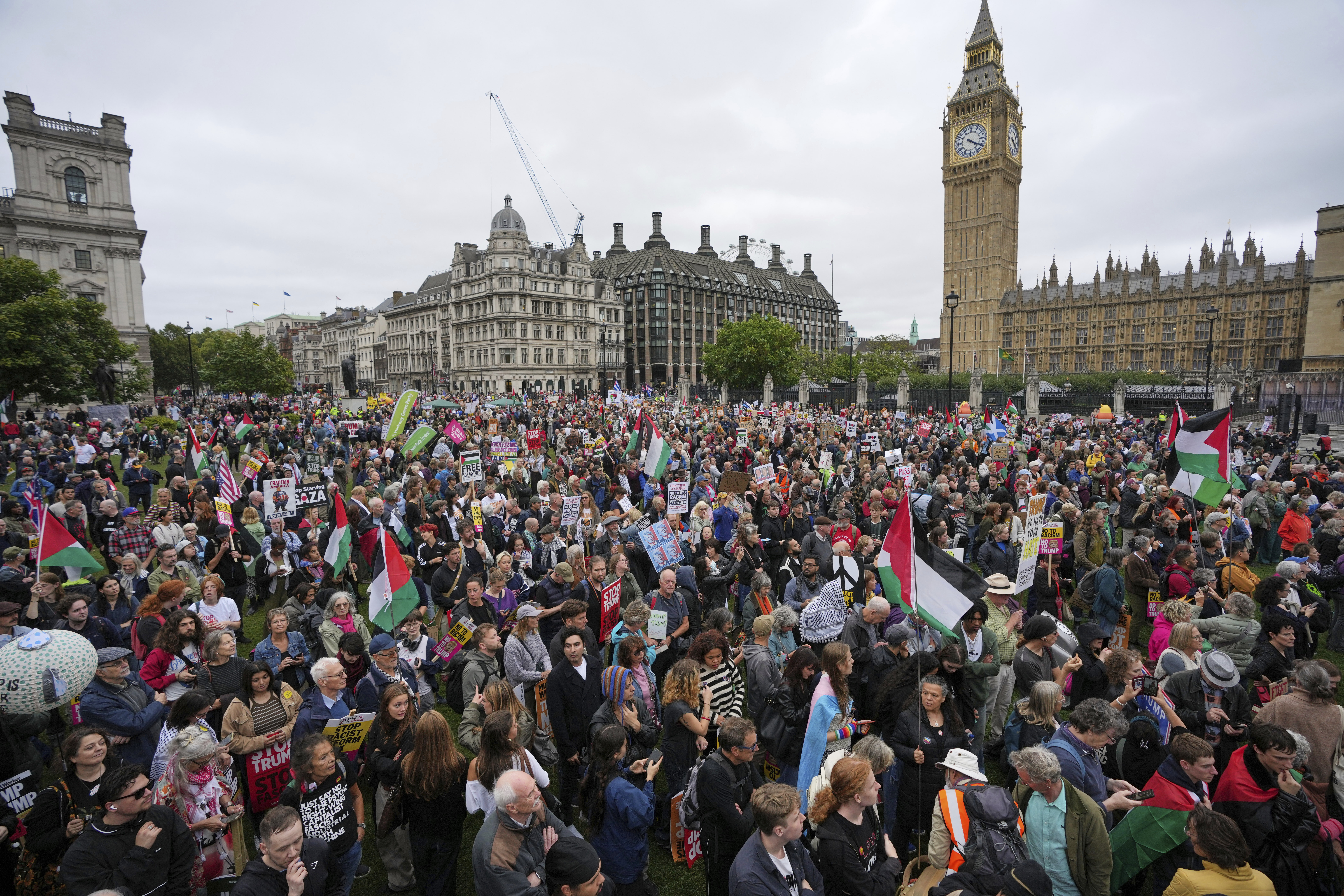 Protesters meet in Parliament Square during a demonstration of the Stop Trump Coalition group against President Donald Trump's state visit in London, Wednesday, Sept. 17, 2025. (Kin Cheung - AP)