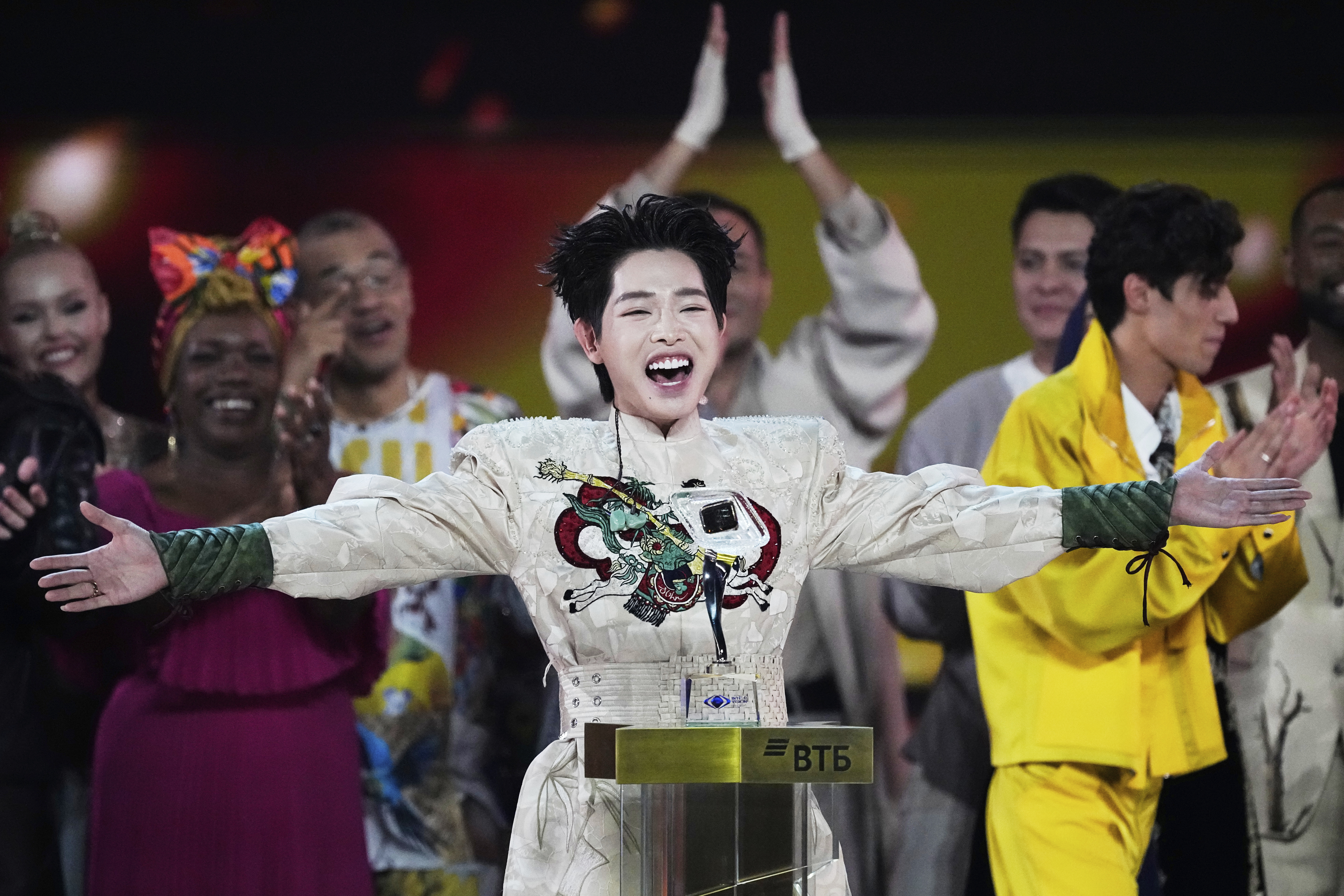 Vietnam's Duc Phuc celebrates after winning the International Music Competition 