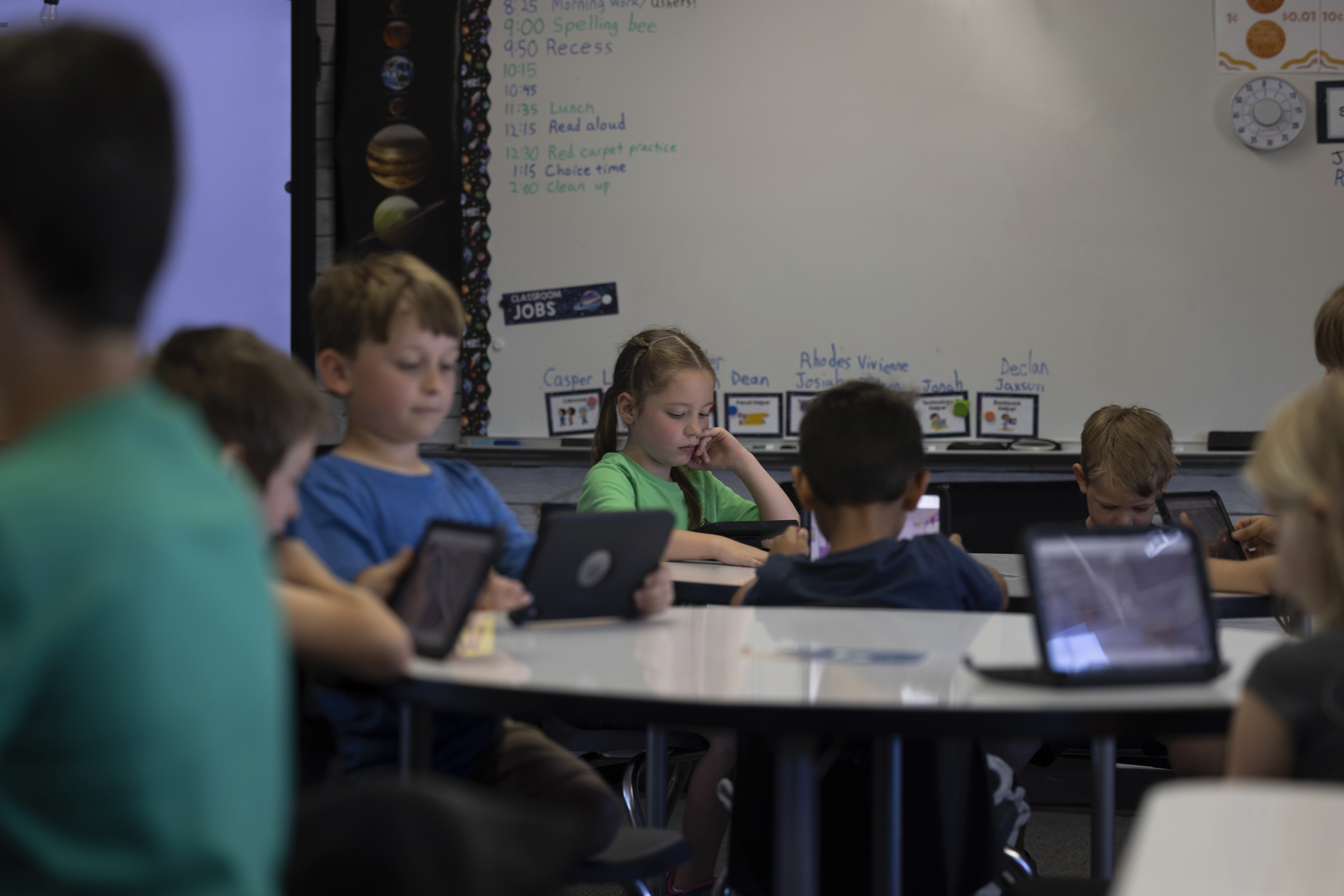 Students work on their tablets in a classroom at Achieve Academy School of Paradise in Paradise, Calif., May 21, 2025. (Miguel Gutierrez Jr. - CalMatters)