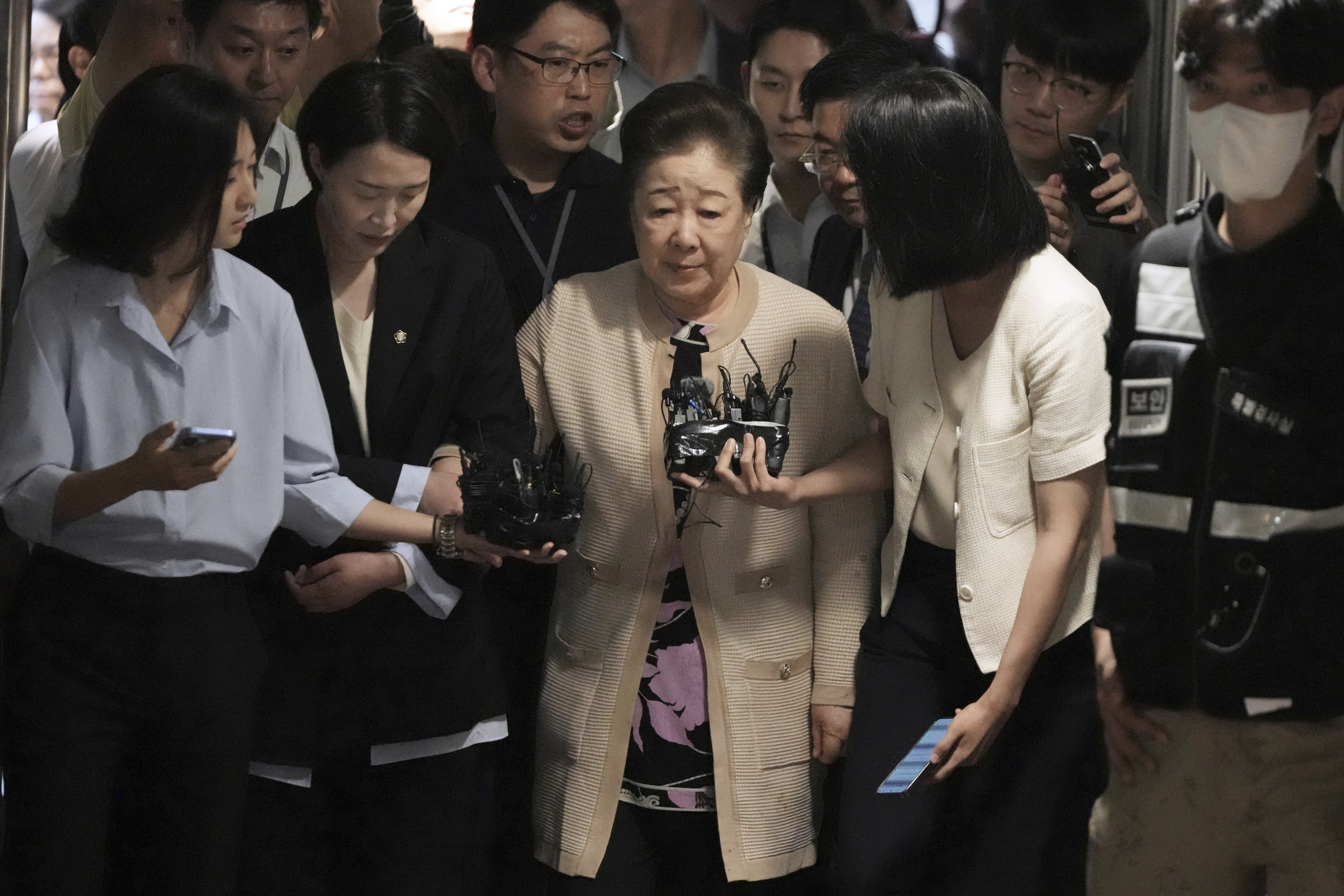 Hak Ja Han, center, the leader of South Korea's Unification Church, arrives at a special prosecutor's office in Seoul, South Korea, Wednesday, Sept. 17, 2025. (Lee Jin-man - AP)