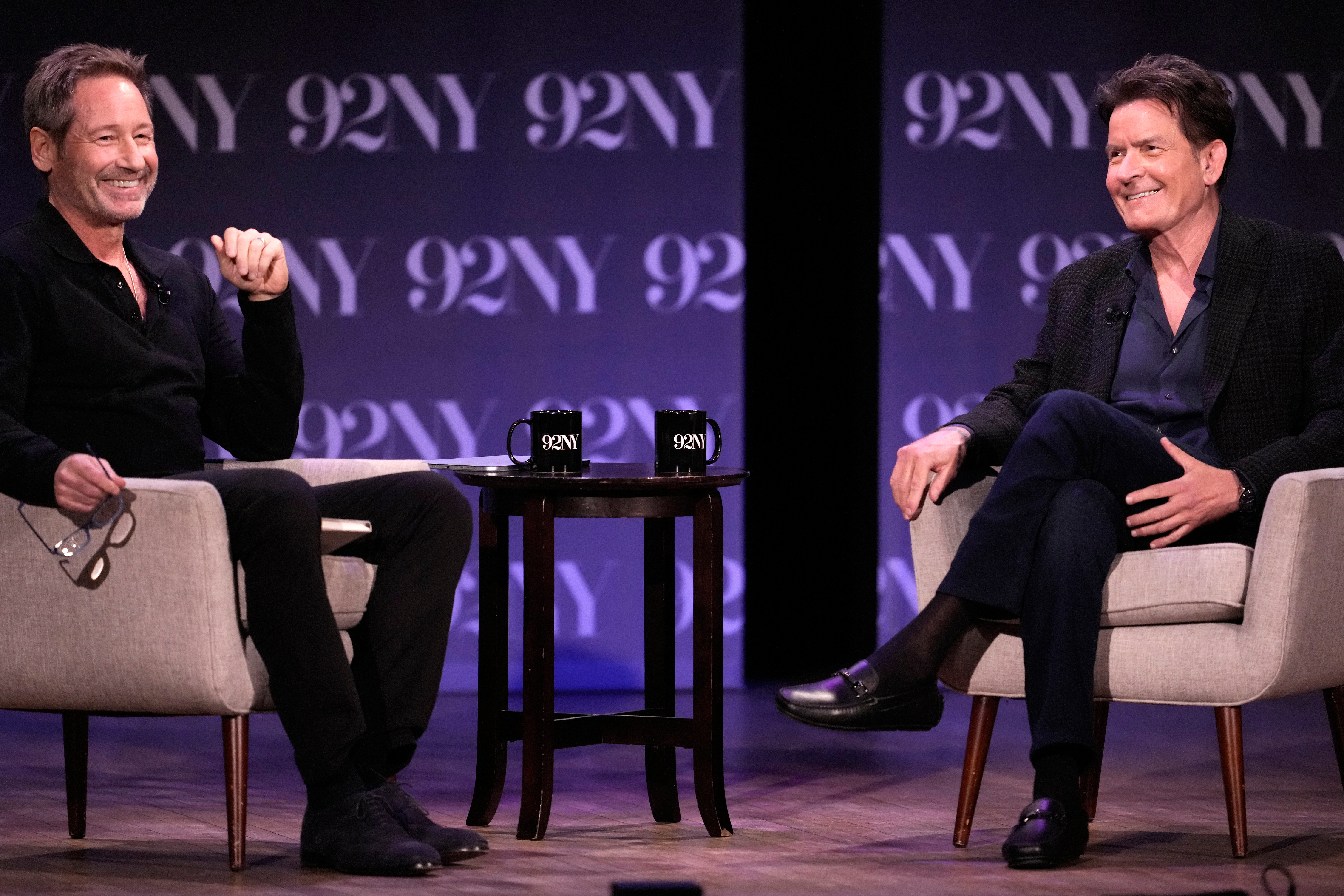 David Duchovny, left, and Charlie Sheen discuss the book