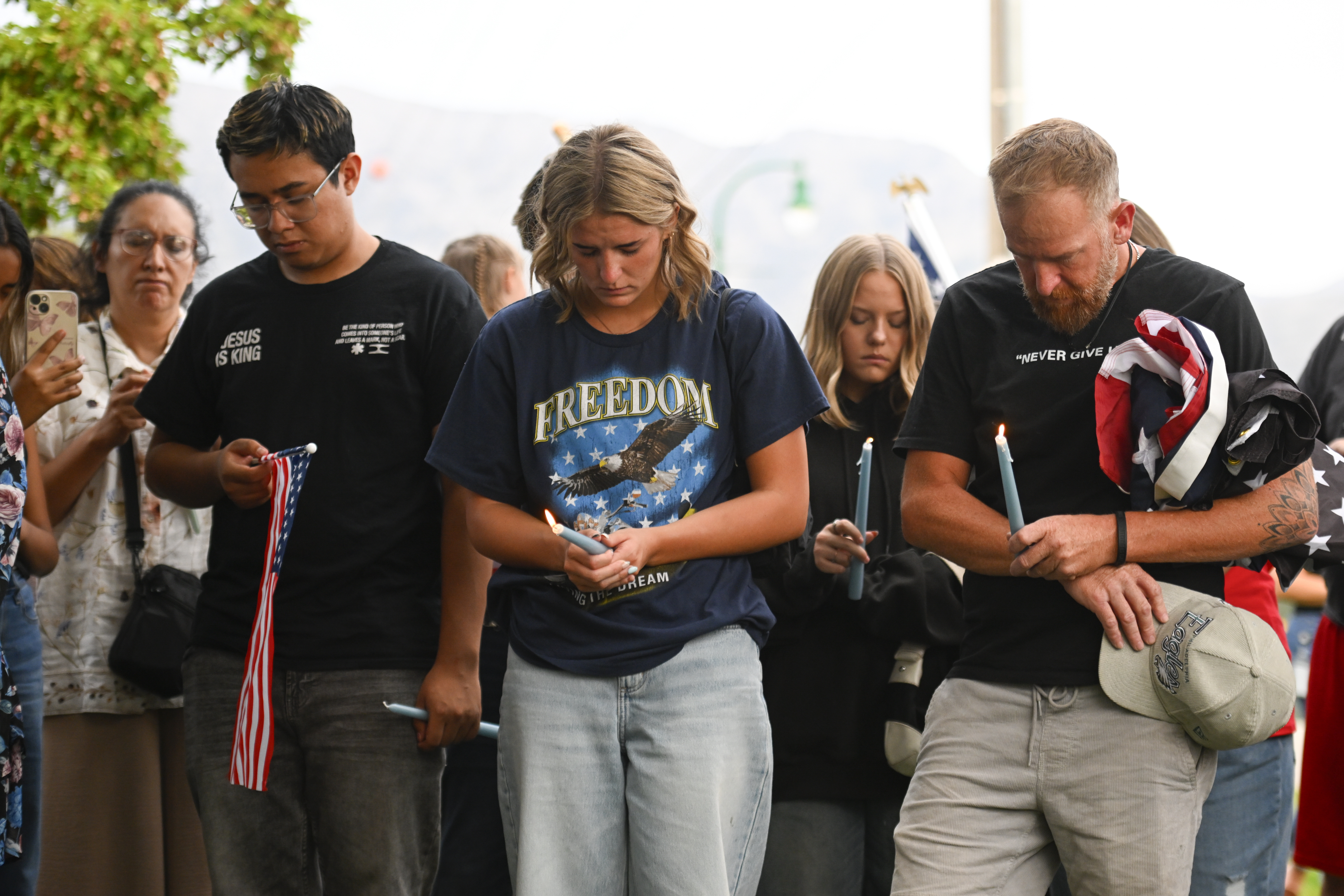 People attend a vigil at Timpanogos Regional Hospital for Charlie Kirk, the CEO and co-founder of Turning Point USA who was shot and killed, on Wednesday, Sept. 10, 2025, in Orem, Utah. (Alex Goodlett - FR171569 AP)