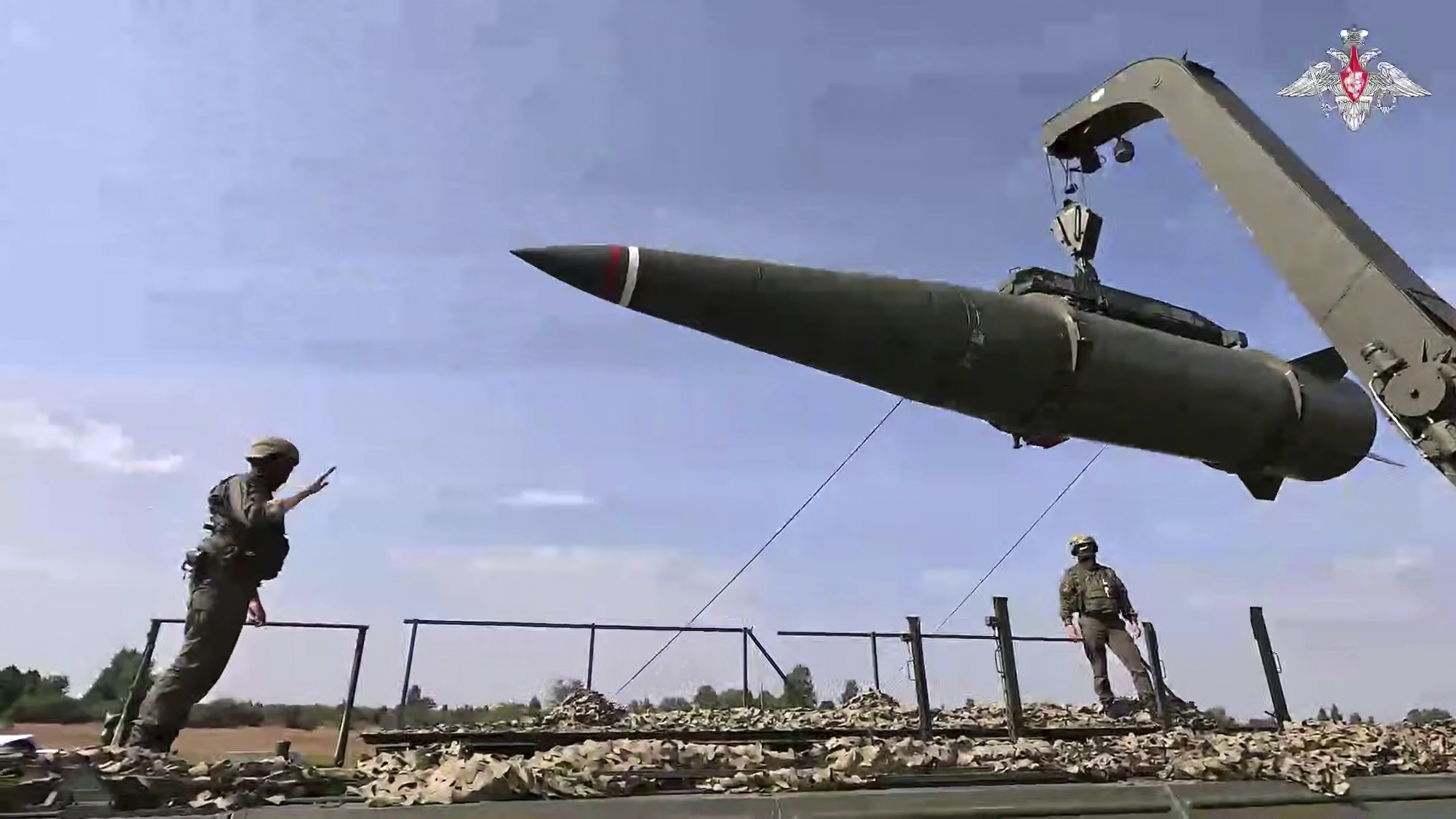 In this photo released by the Russian Defense Ministry Press Service on Monday, Sept. 15, 2025, Russian troops load an Iskander missile onto a mobile launcher during the joint Russian-Belarusian military drills at an undisclosed location in Kaliningrad region of Russia. (Uncredited - Russian Defense Ministry Press Service)