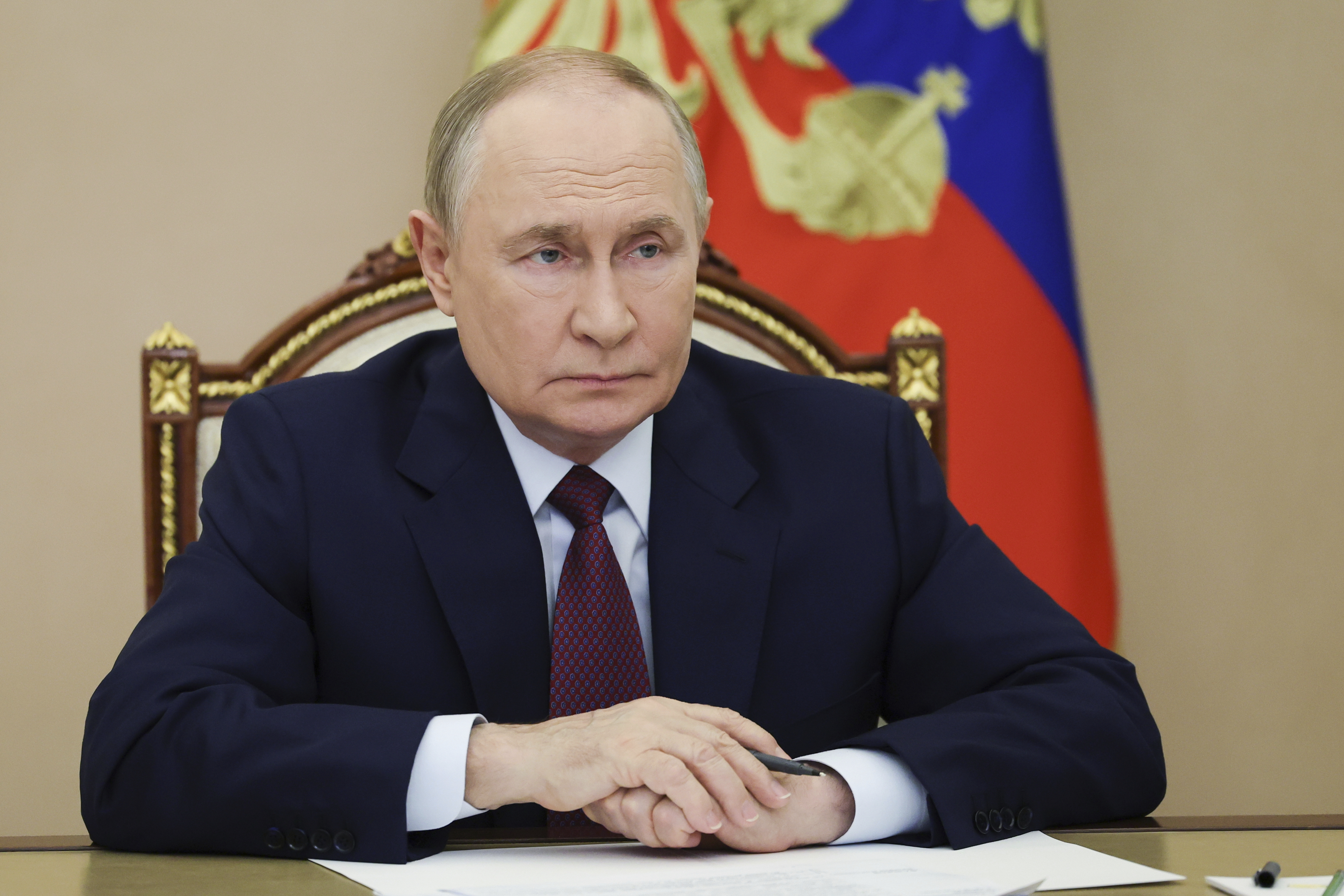 Russian President Vladimir Putin leads a cabinet meeting via videoconference at the Kremlin in Moscow, Wednesday, Sept. 17, 2025. (Vyacheslav Prokofyev - Pool Sputnik Kremlin)