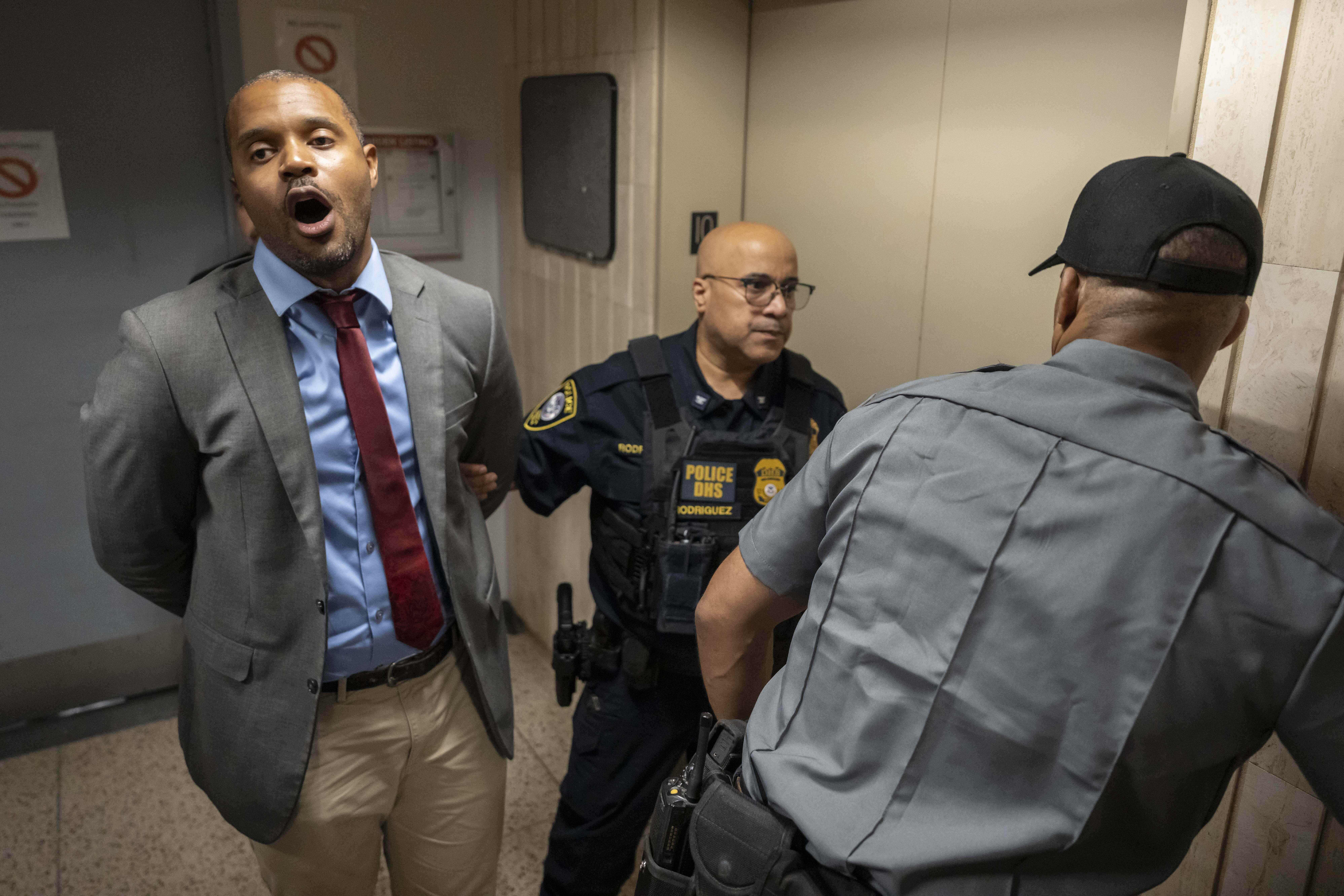 Elected officials among dozens of protesters arrested at a Manhattan immigration holding facility