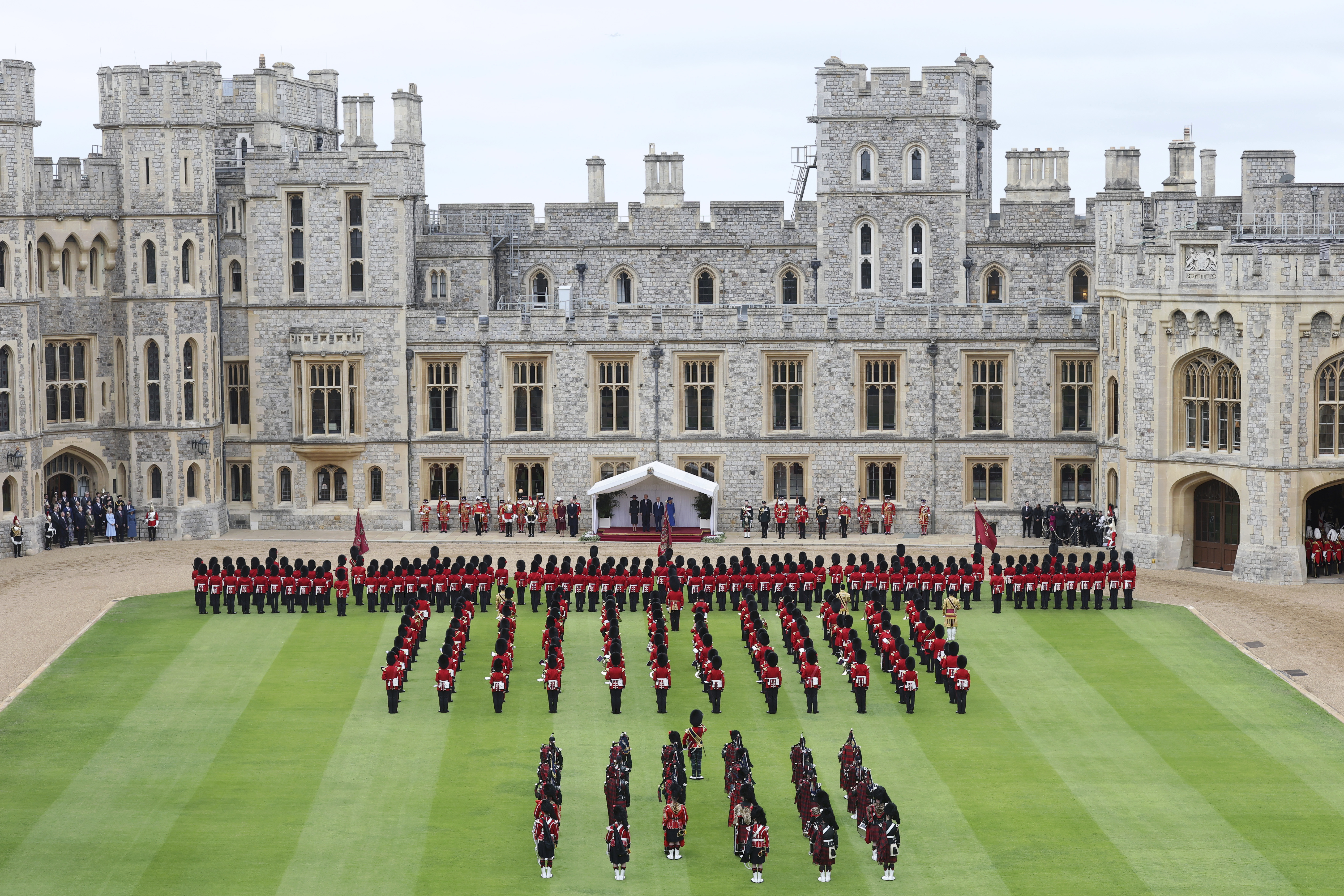 President Donald Trump, Britain's King Charles III, Queen Camilla and Melania Trump, center, review the Guard of Honour at Windsor Castle in Windsor, England, Wednesday Sept. 17, 2025. (Chris Jackson - Pool Getty Images)