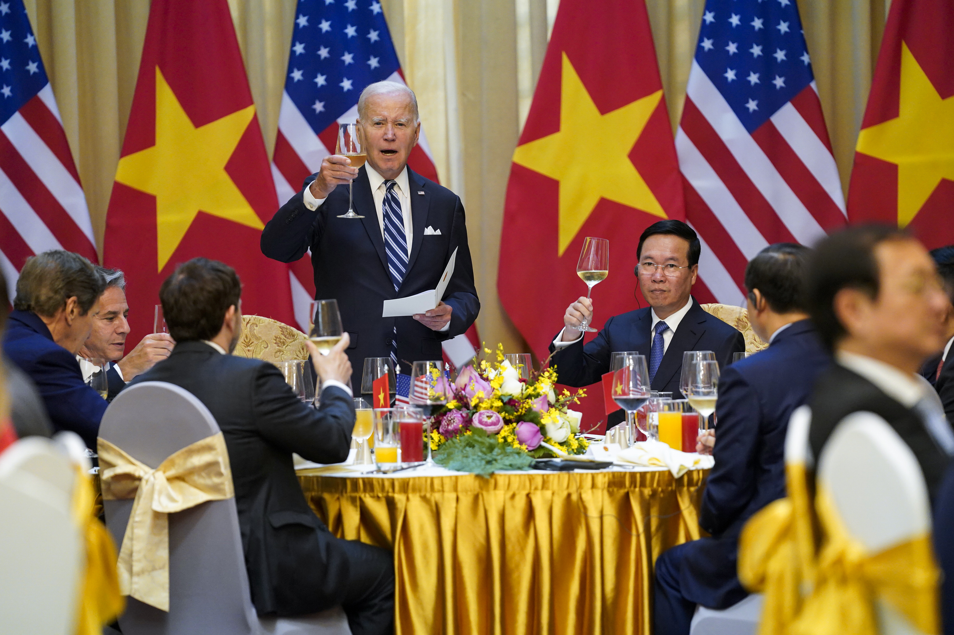 FILE - U.S. President Joe Biden raises a toast as he participates in a State Luncheon with Vietnam President Vo Van Thuong in Hanoi, Vietnam, on Sept. 11, 2023. (Evan Vucci - AP)