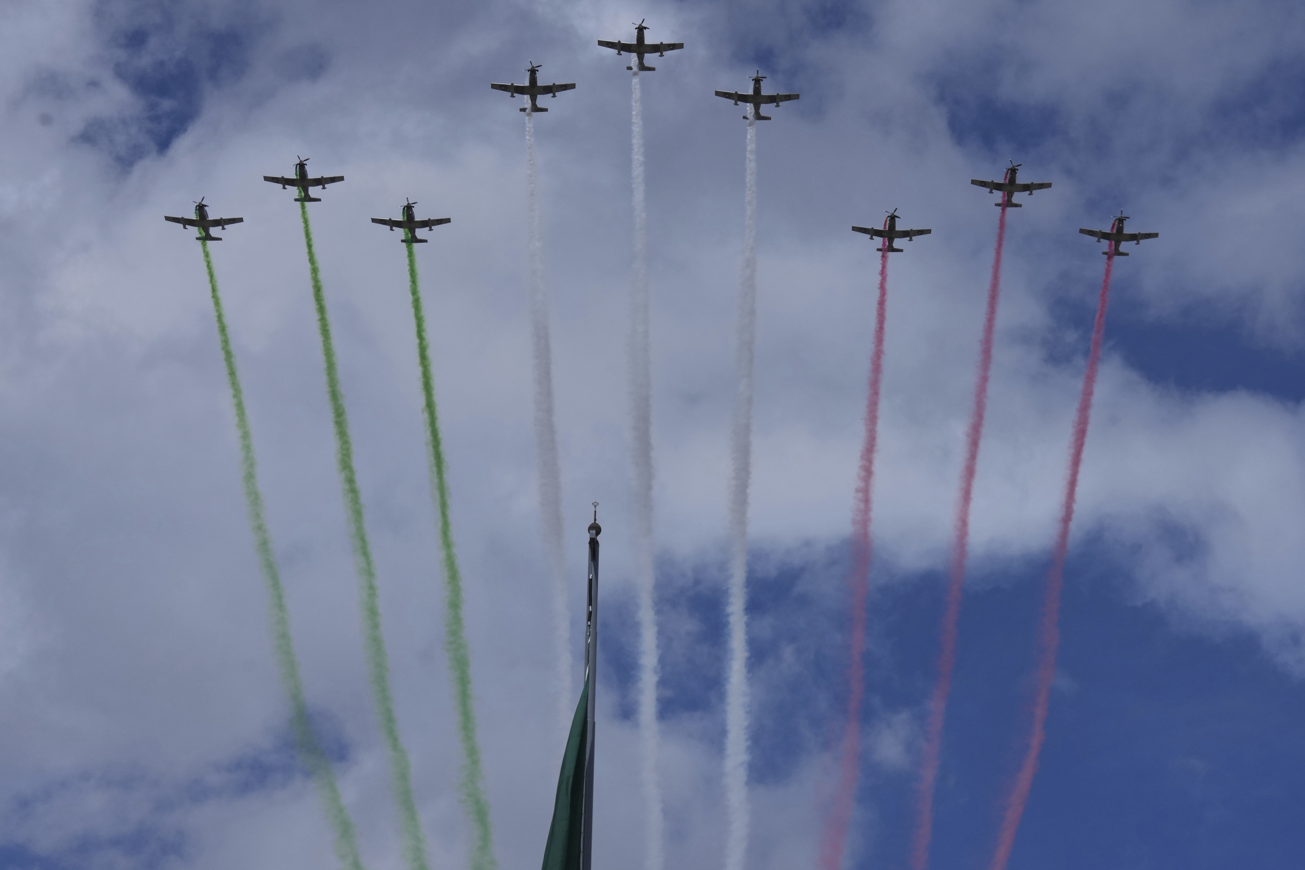 Planes fly with contrails of the colors of Mexico's flag during the annual Independence Day military parade in Mexico City, Tuesday, Sept. 16, 2025. (Fernando Llano - AP)