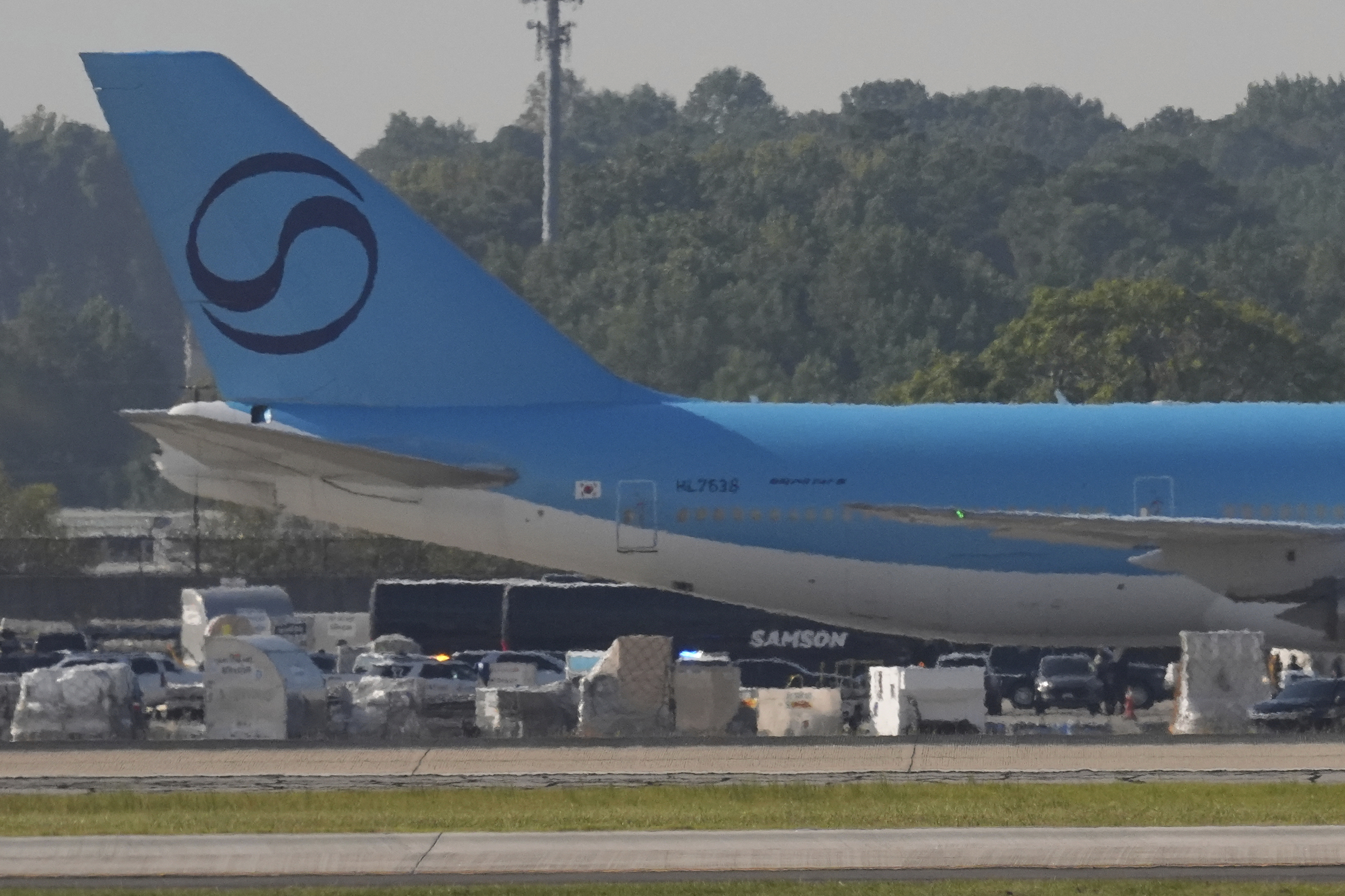 Buses carrying Korean workers detained arrive at Hartsfield-Jackson International Airport in Atlanta, Thursday, Sept. 11, 2025. (George Walker IV - AP)