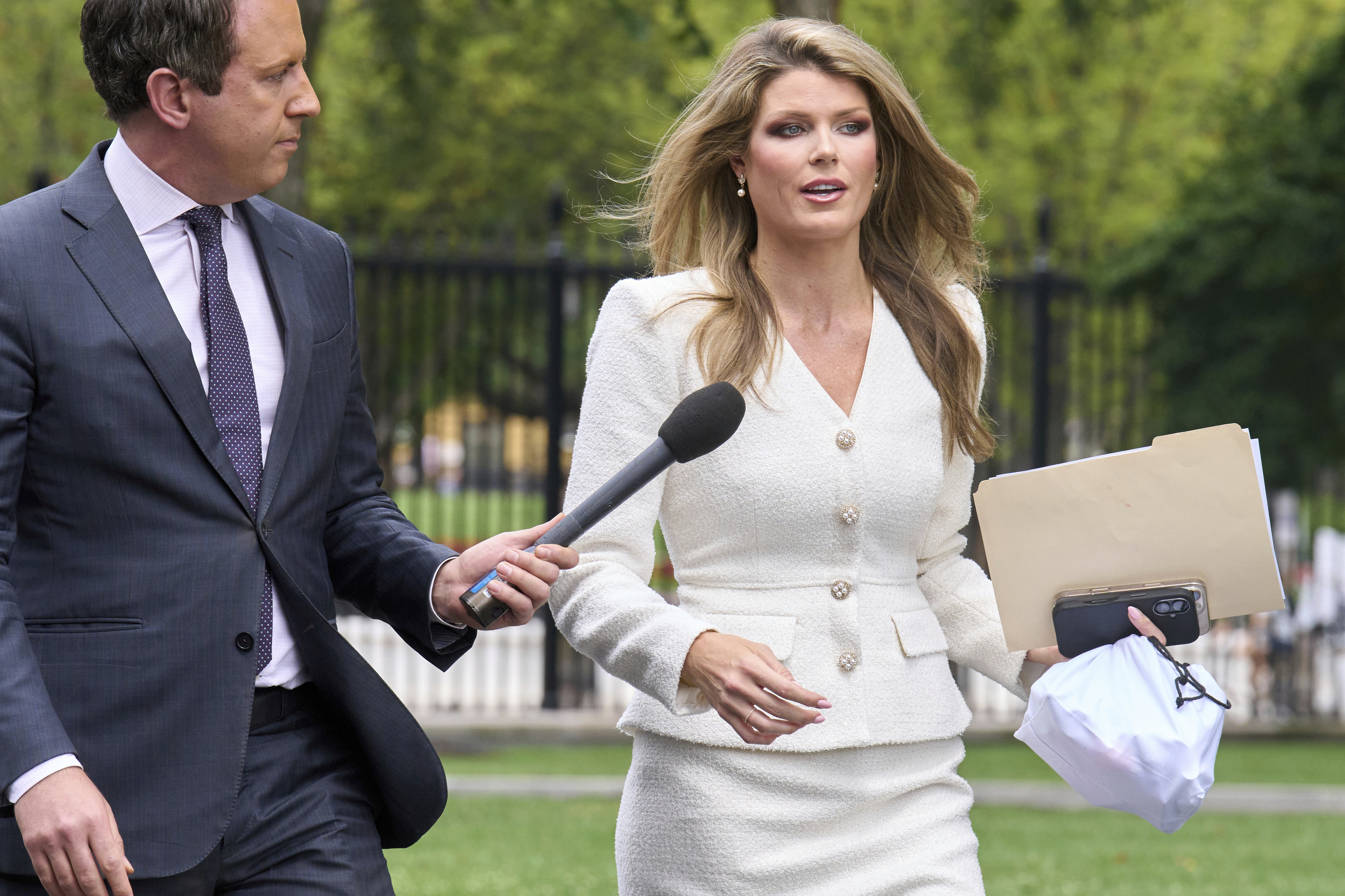FILE - Lindsey Halligan, special assistant to the president, speaks with a reporter outside of the White House, Wednesday, Aug. 20, 2025, in Washington. (Jacquelyn Martin - AP)