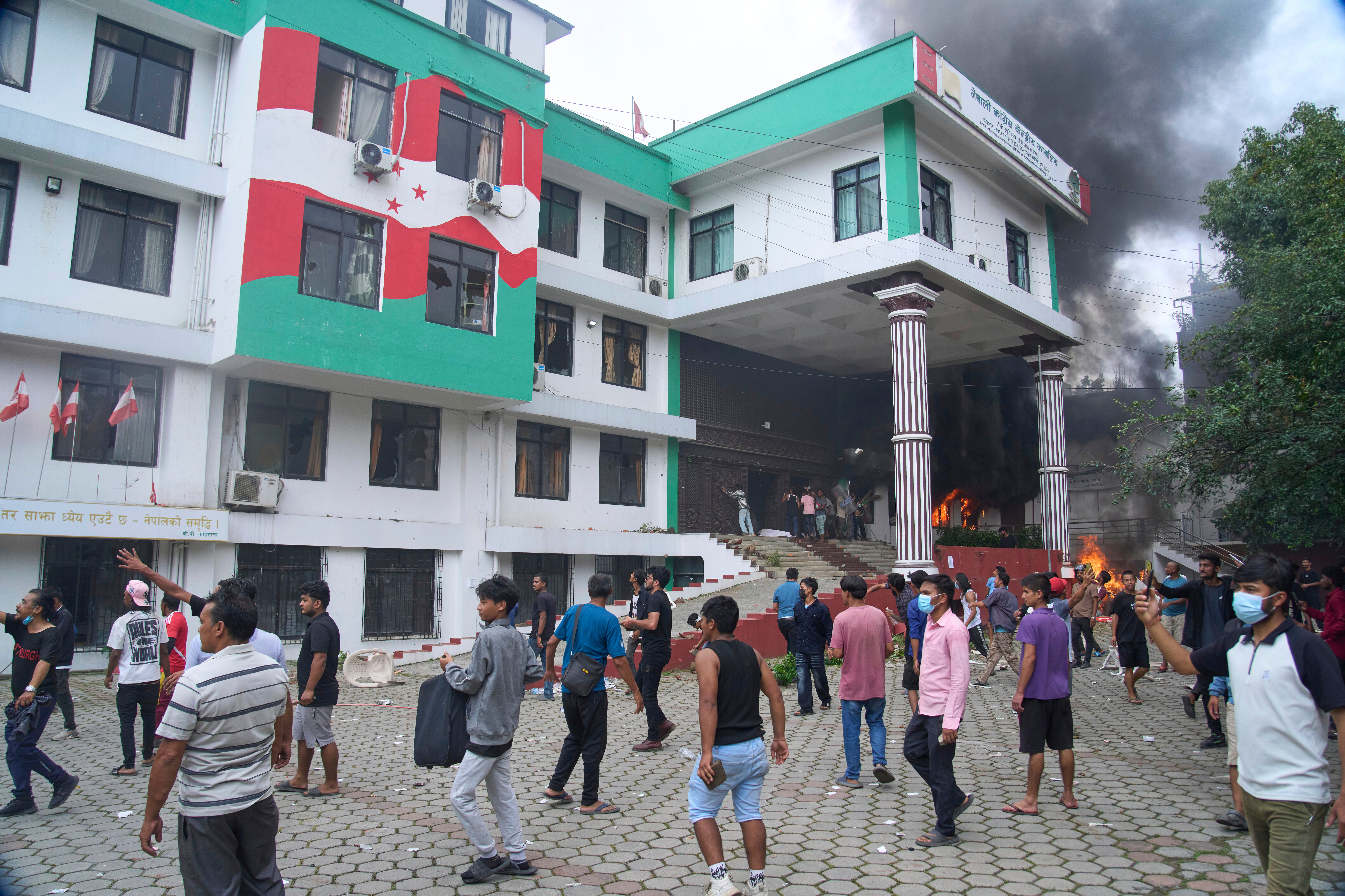 Protesters vandalize Nepalese congress party central office during protests against social media ban and corruption in Kathmandu, Nepal, Tuesday, Sept. 9, 2025. (Niranjan Shrestha - AP)