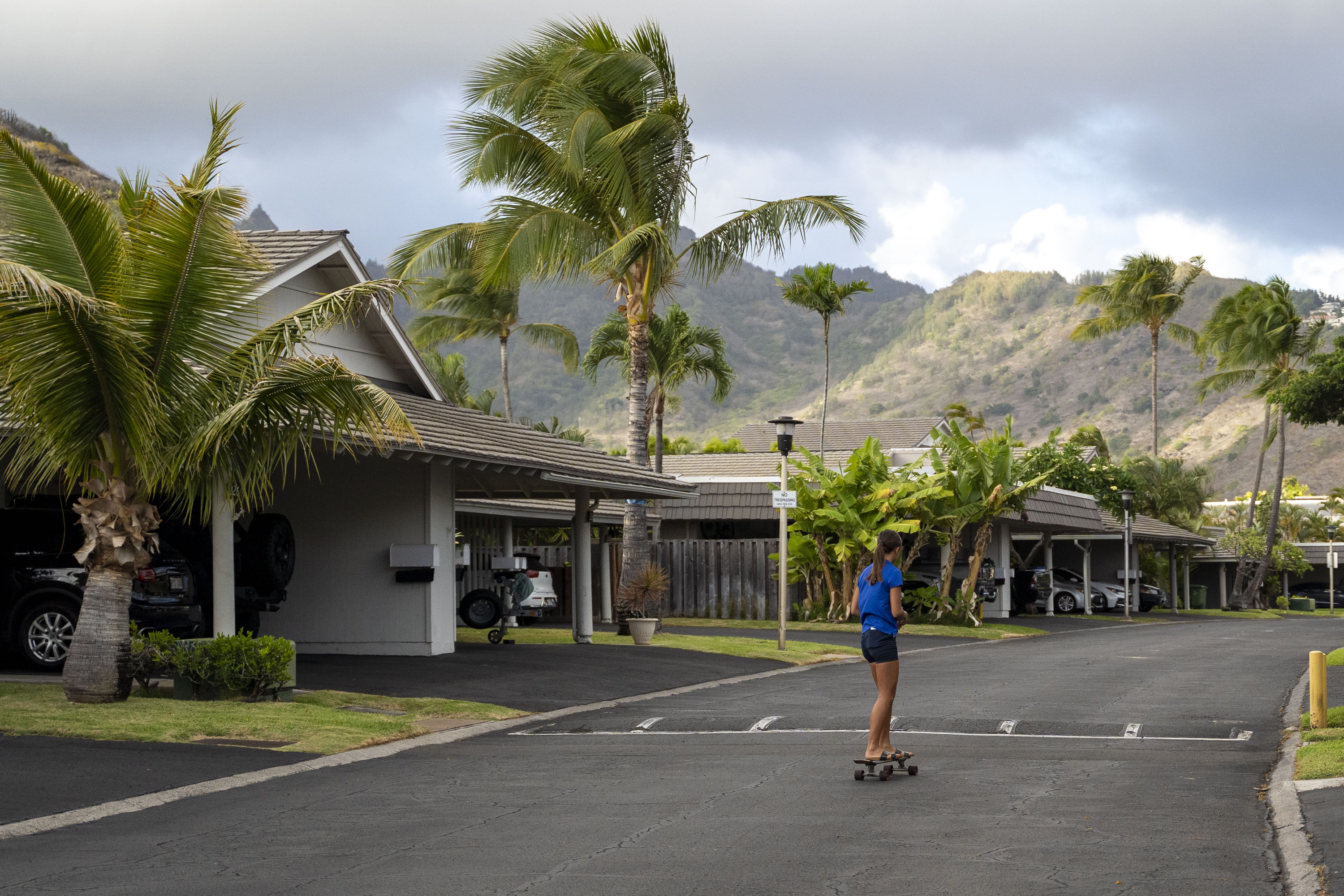 Kapua Ong skateboards near her home in Honolulu, on Thursday, Sept. 11, 2025. (Mengshin Lin - FR172028 AP)