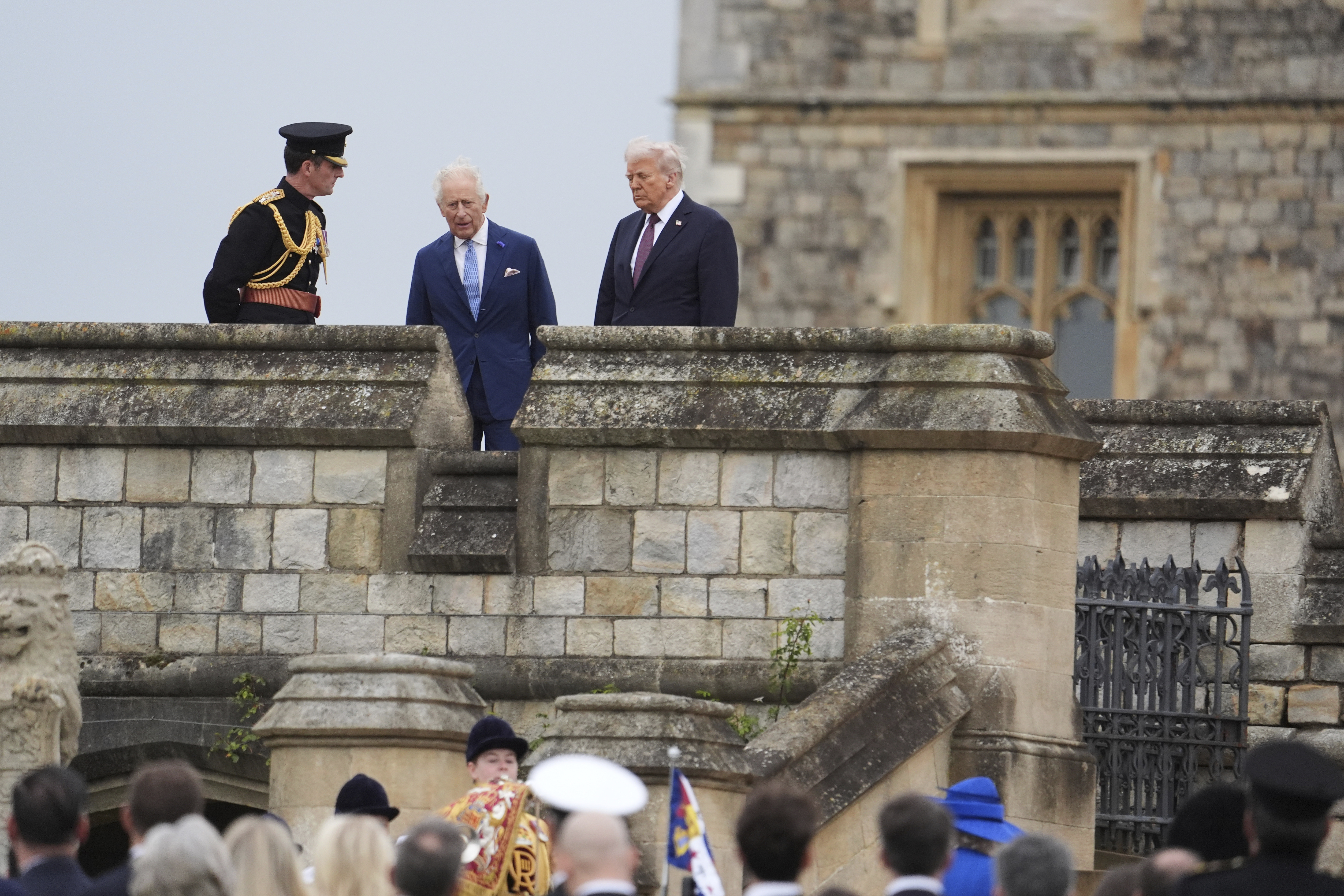 President Donald Trump and Britain's King Charles III walk together as they arrive for a Beating Retreat musical performance on the East Lawn of Windsor Castle, in Windsor, England, Wednesday, Sept. 17, 2025. (Evan Vucci - AP)