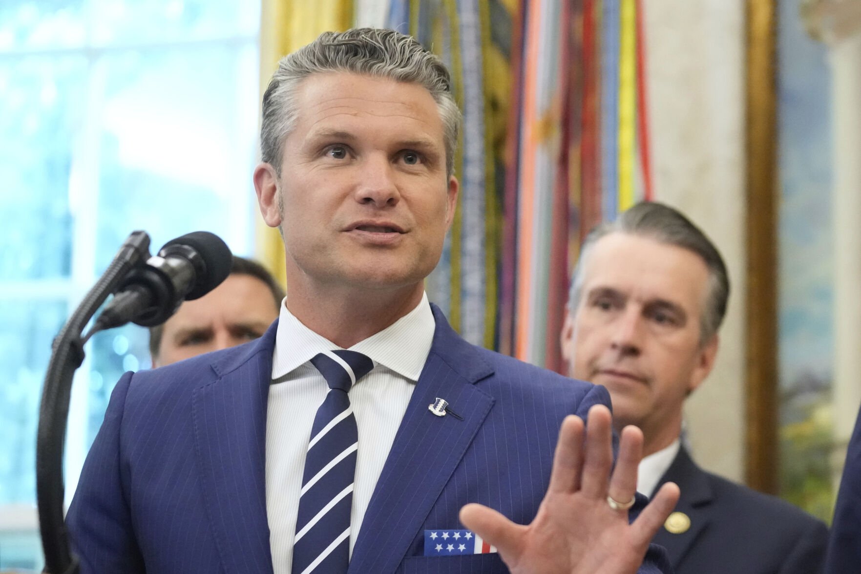 Defense Secretary Pete Hegseth speaks at an event with President Donald Trump on the relocation of U.S. Space Command headquarters from Colorado to Alabama in the Oval Office of the White House, Tuesday, Sept. 2, 2025, in Washington. (AP Photo/Mark Schiefelbein) (Mark Schiefelbein)