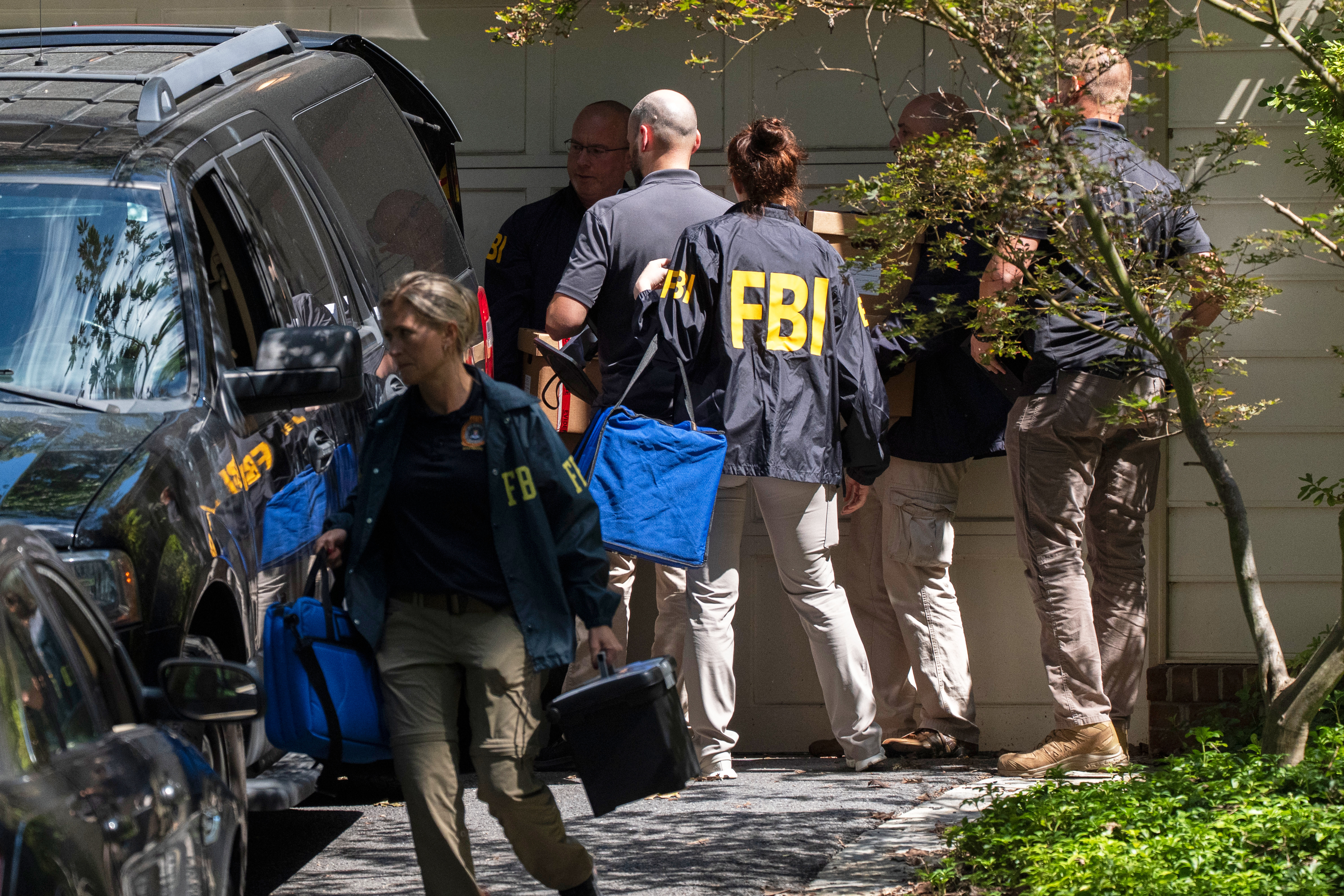 Judge releases redacted document used to justify search of John Bolton’s home