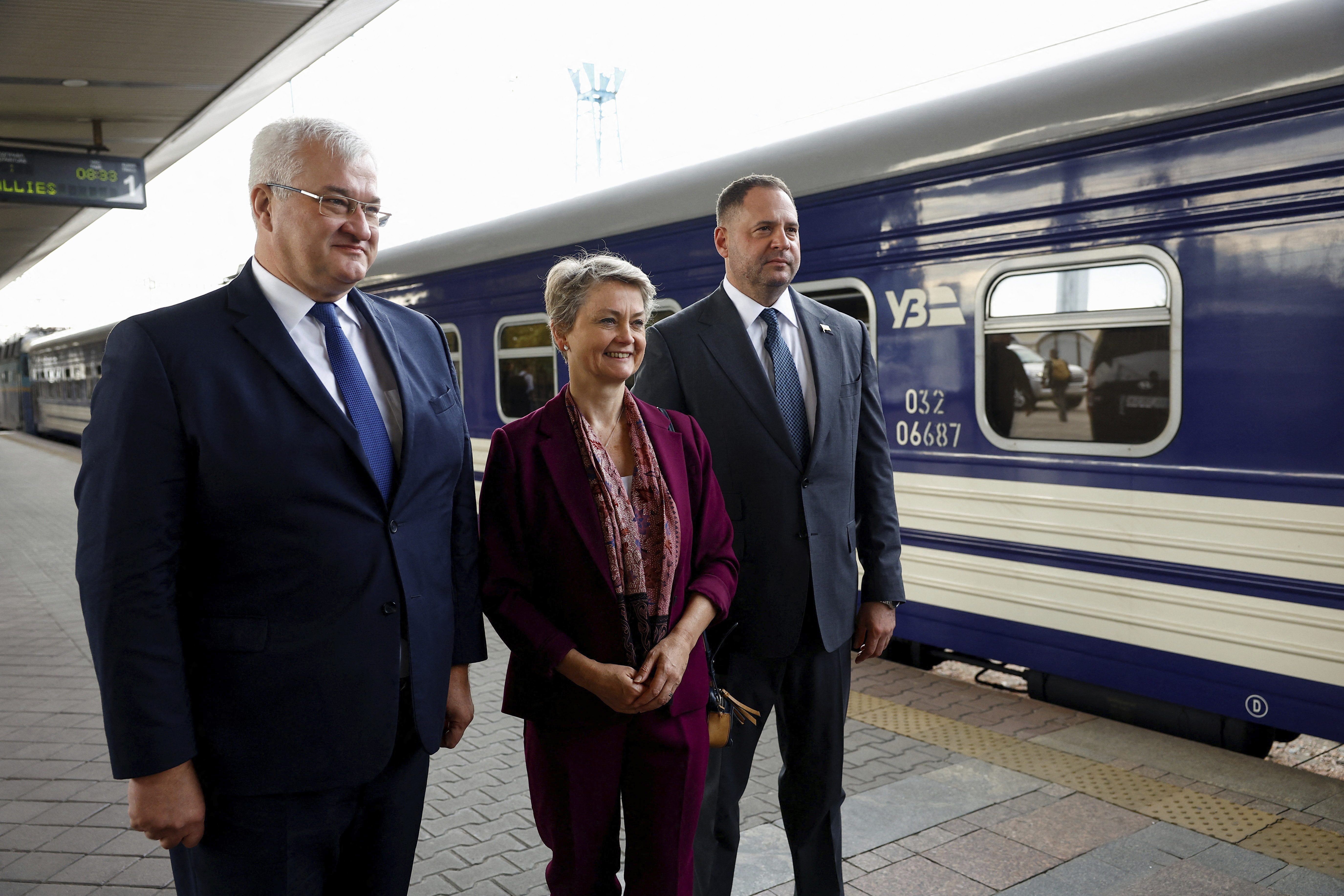 Ukrainian Foreign Minister Andrii Sybiha, left, and Head of the Office of the President of Ukraine Andriy Yermak, right, welcome British Foreign Secretary Yvette Cooper upon her arrival at a railway station, amid Russia's attack on Ukraine, in Kyiv, Ukraine, Friday Sept. 12, 2025. (Valentyn Ogirenko - Pool Reuters)