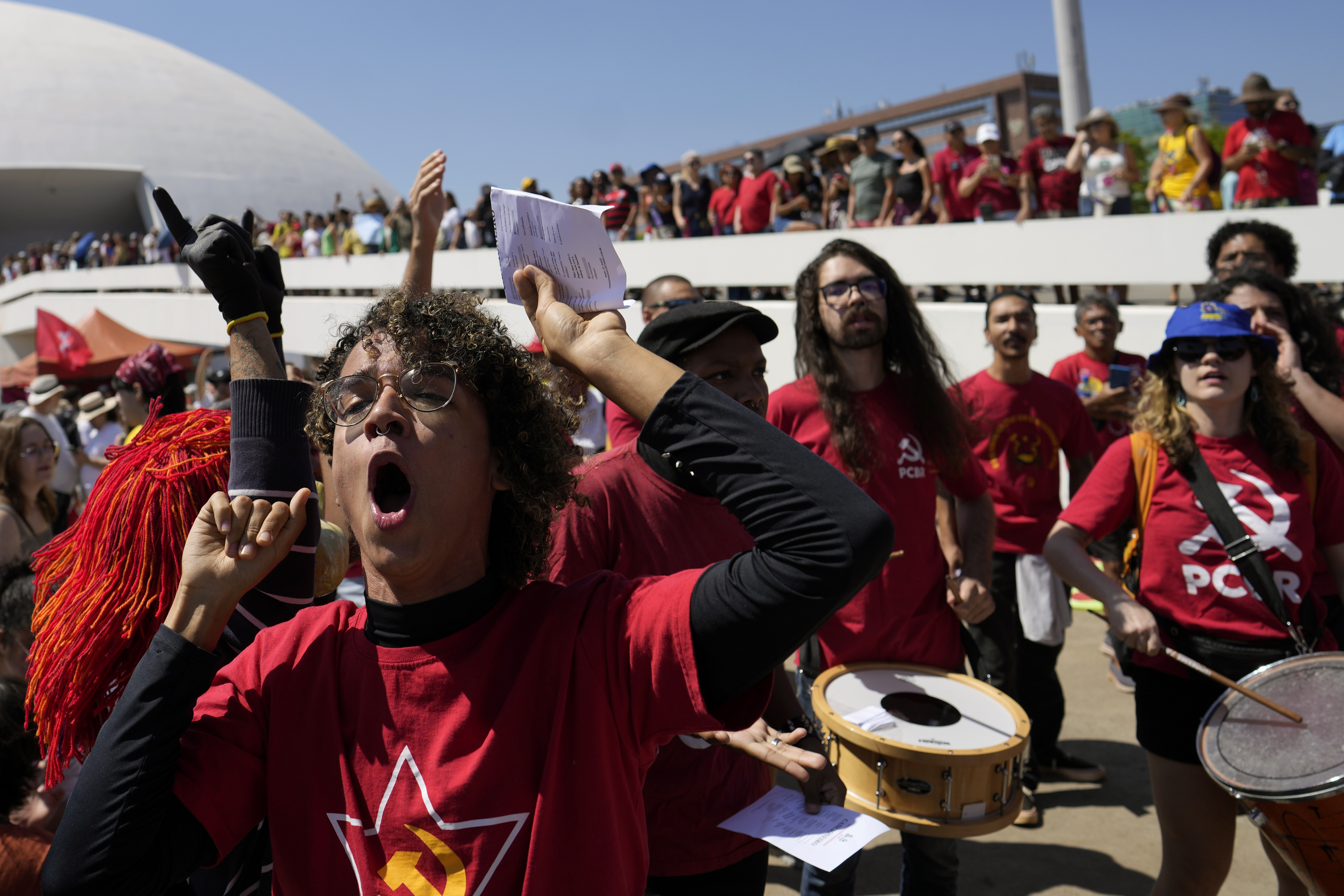 Demonstrators chant 