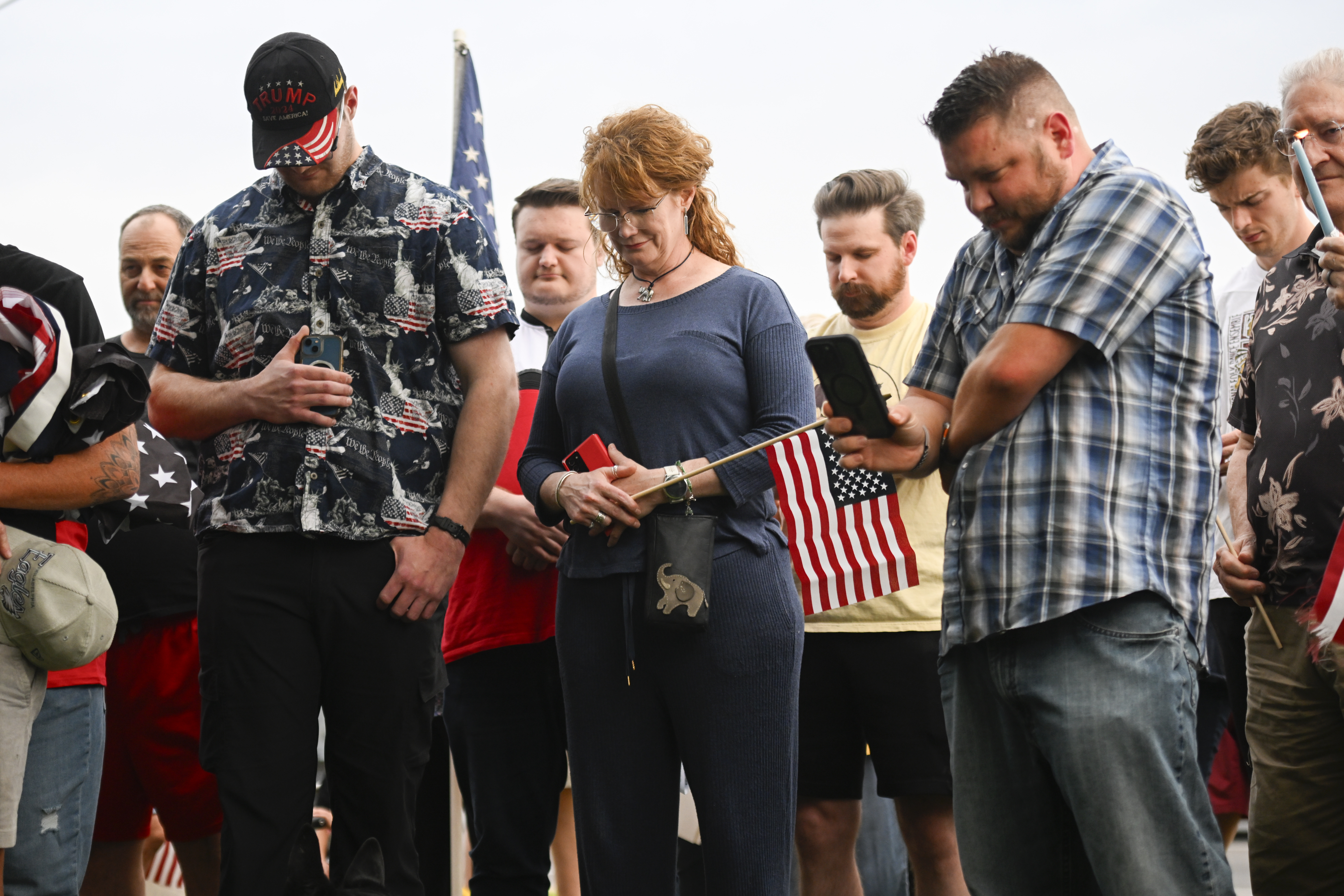 People attend a vigil at Timpanogos Regional Hospital for Charlie Kirk, the CEO and co-founder of Turning Point USA who was shot and killed, Wednesday, Sept. 10, 2025, in Orem, Utah. (Alex Goodlett - FR171569 AP)