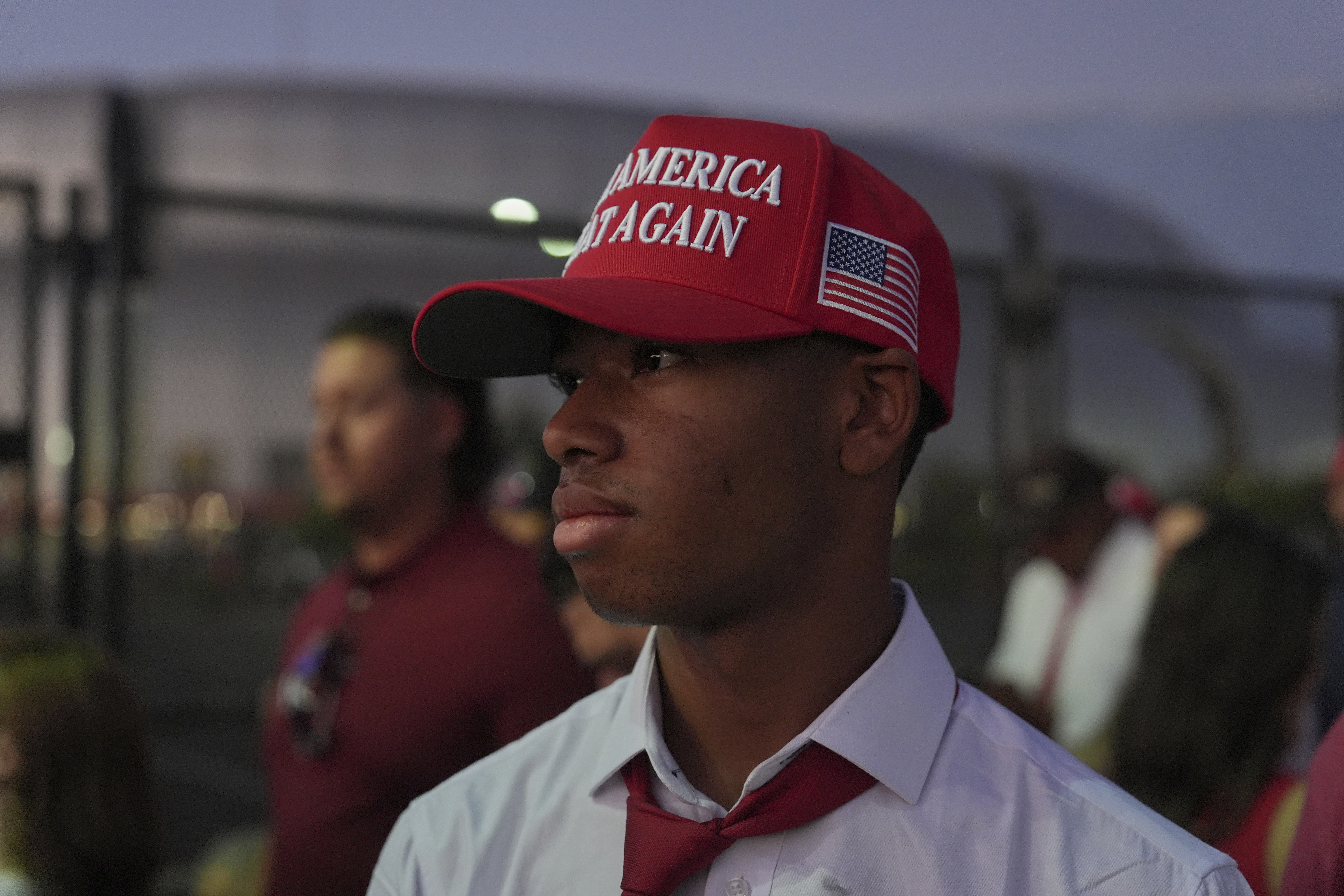 Bryson Levy waits in line before a memorial for conservative activist Charlie Kirk Sunday, Sept. 21, 2025, at State Farm Stadium in Glendale, Ariz. (Jae C. Hong - AP)