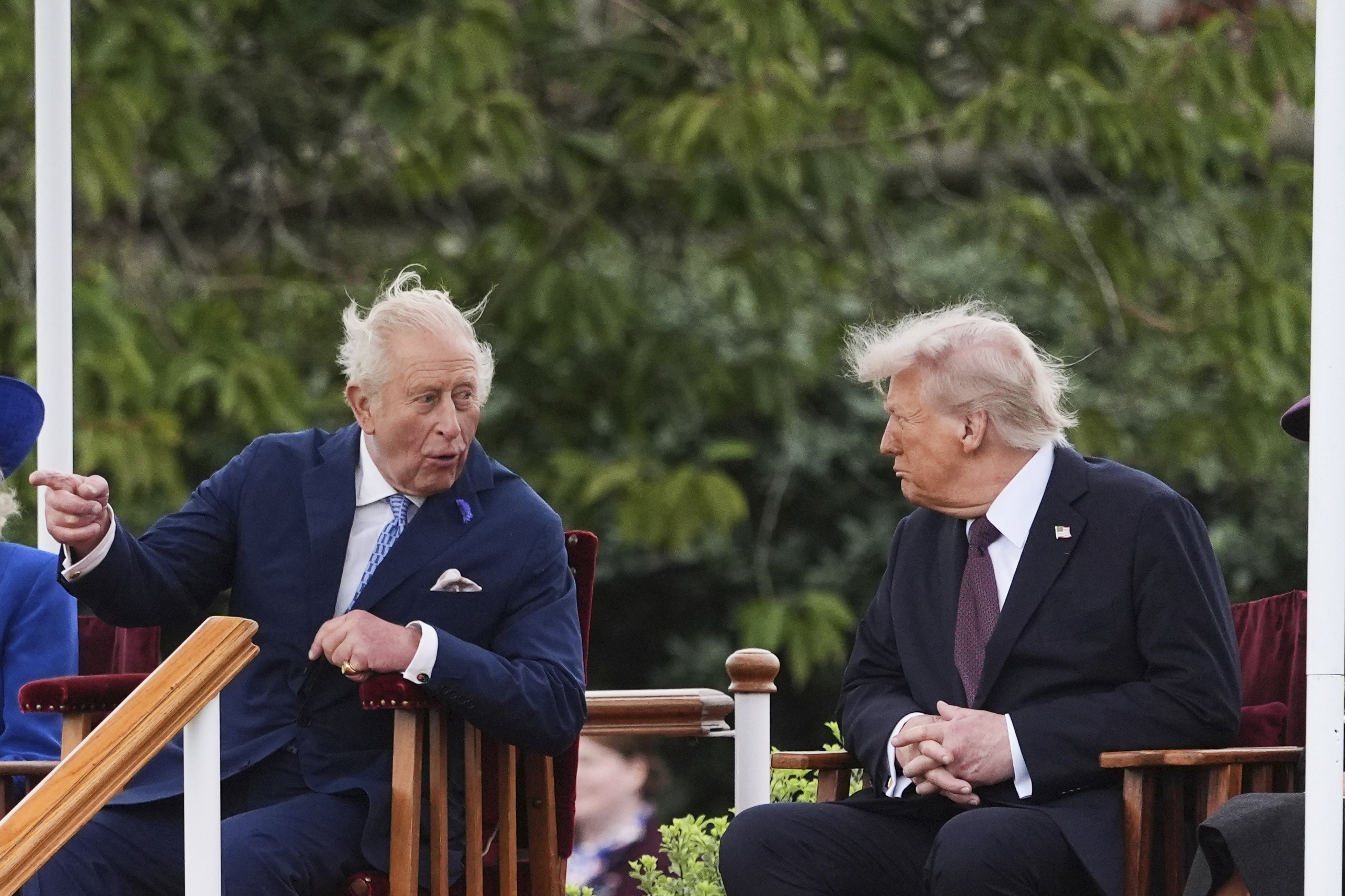 President Donald Trump, right, speaks with Britain's King Charles III as they attend a Beating Retreat musical performance on the East Lawn of Windsor Castle, in Windsor, England, Wednesday, Sept. 17, 2025. (Evan Vucci - AP)