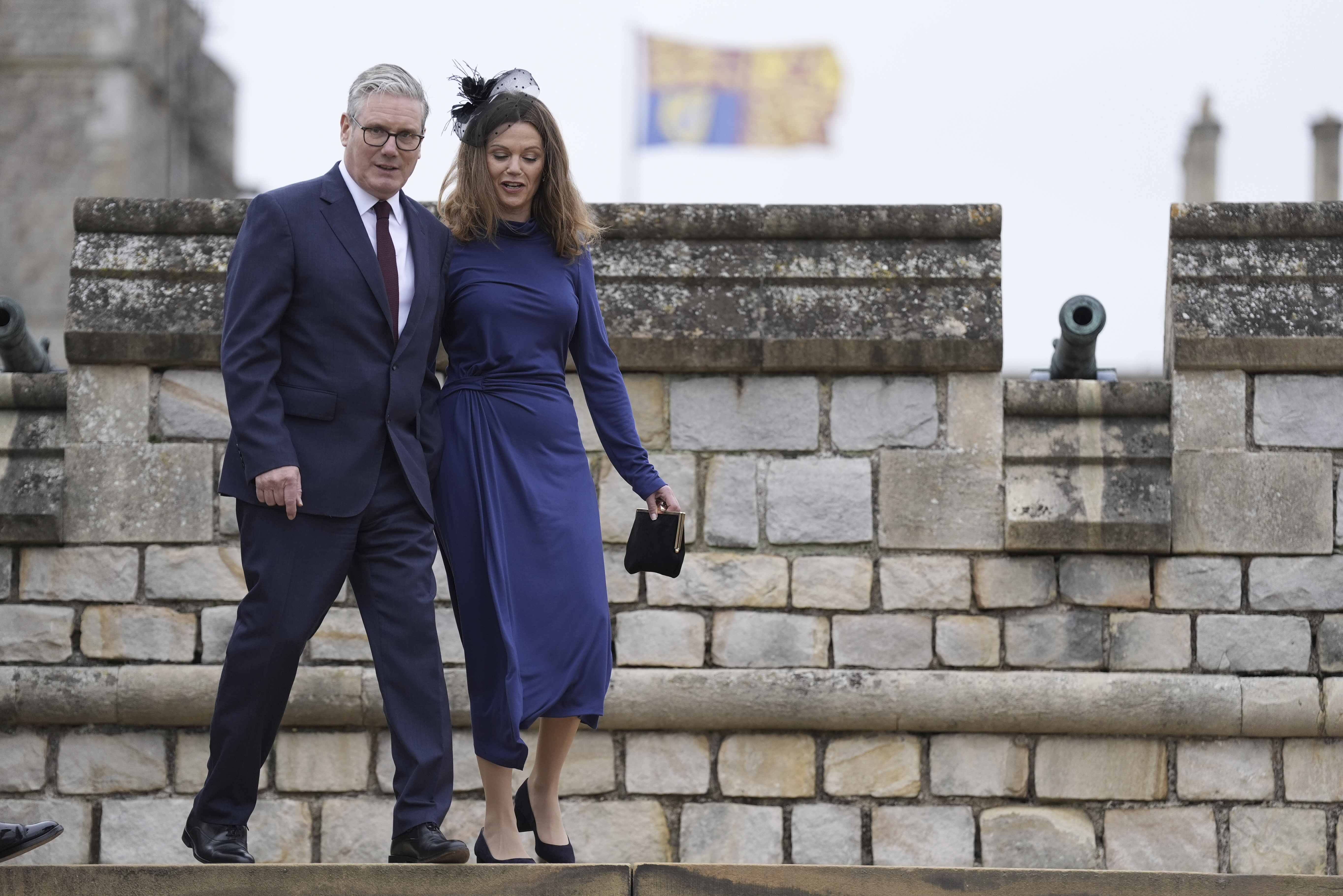 British Prime Minister Sir Keir Starmer and wife, Lady Victoria Starmer, arrive for the Beating Retreat military ceremony at Windsor Castle, England, on Wednesday Sept. 17, 2025, day one of the president's second state visit to the UK. (Andrew Matthews - Pool PA)