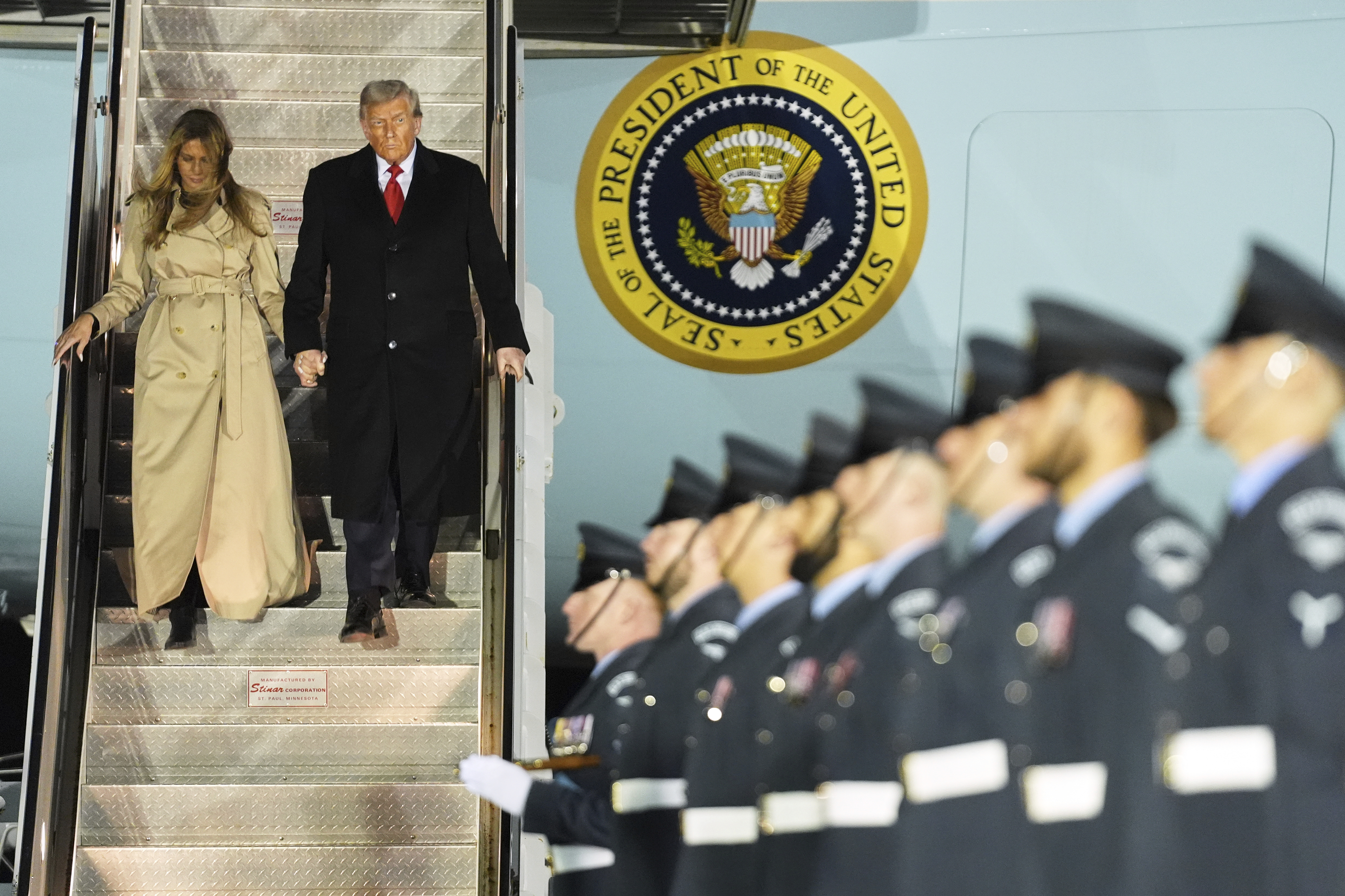 President Donald Trump and first lady Melania Trump exit Air Force One as they arrive at Stansted Airport near London, Tuesday, Sept. 16, 2025. (Evan Vucci - AP)