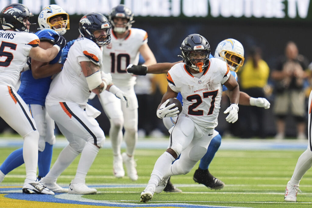 Denver Broncos vs Los Angeles Chargers NFL game action at SoFi Stadium