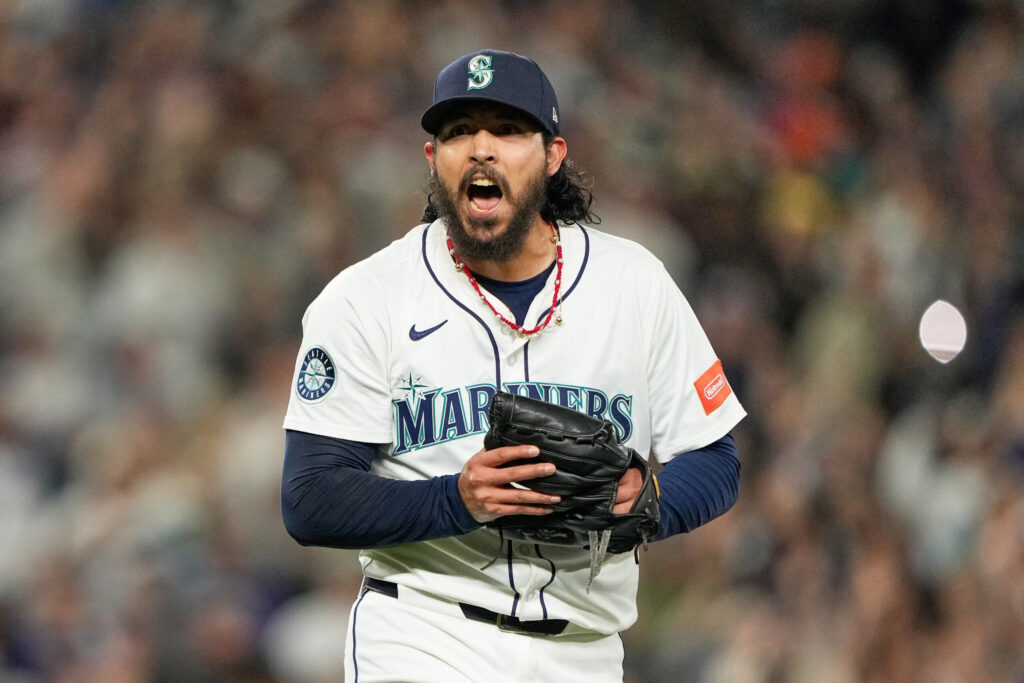 Surging Mariners clinch playoff berth with win over Colorado Rockies