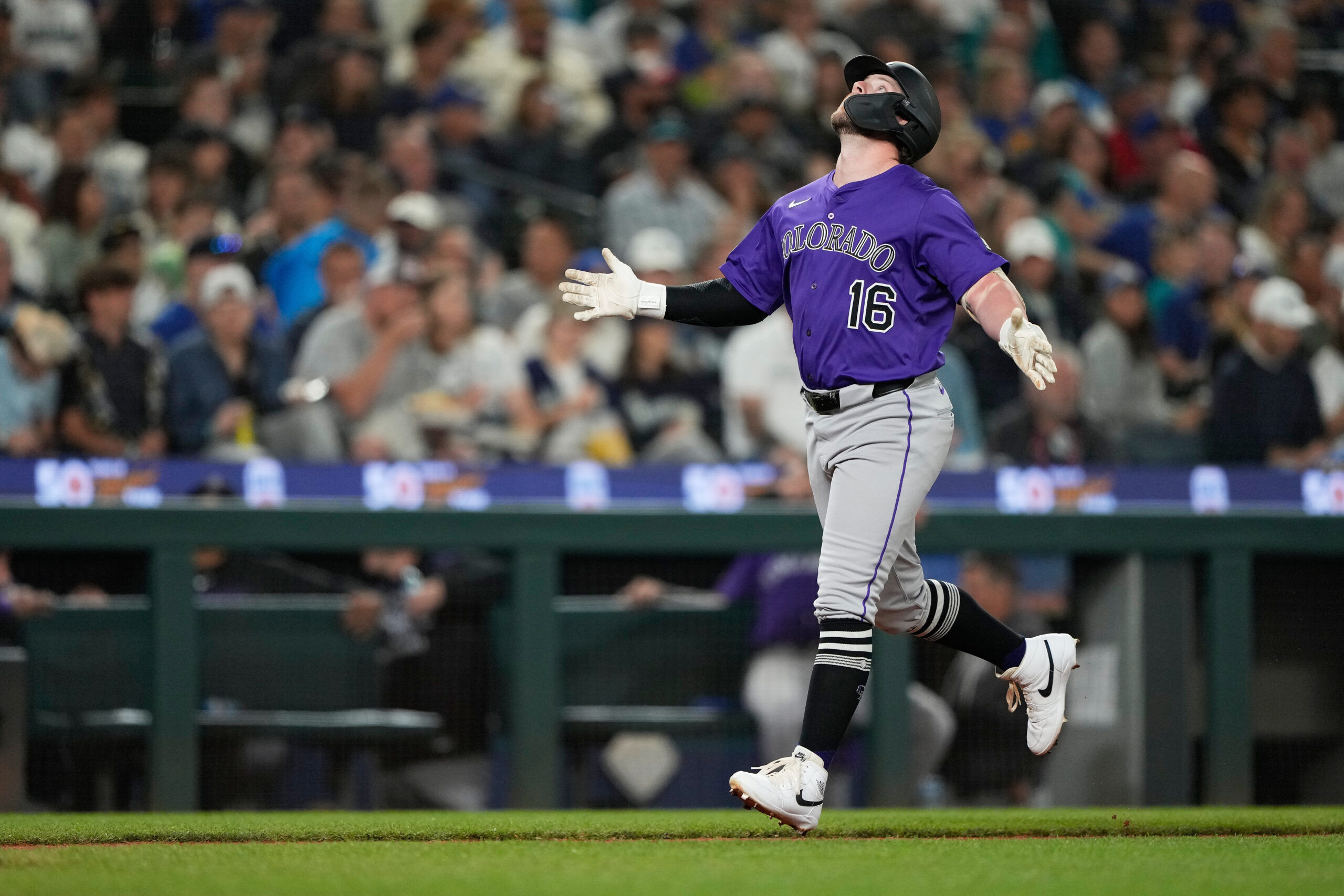 Mariners win AL West for 1st time in 24 years as Raleigh reaches 60 homers in 9-2 win over Rockies