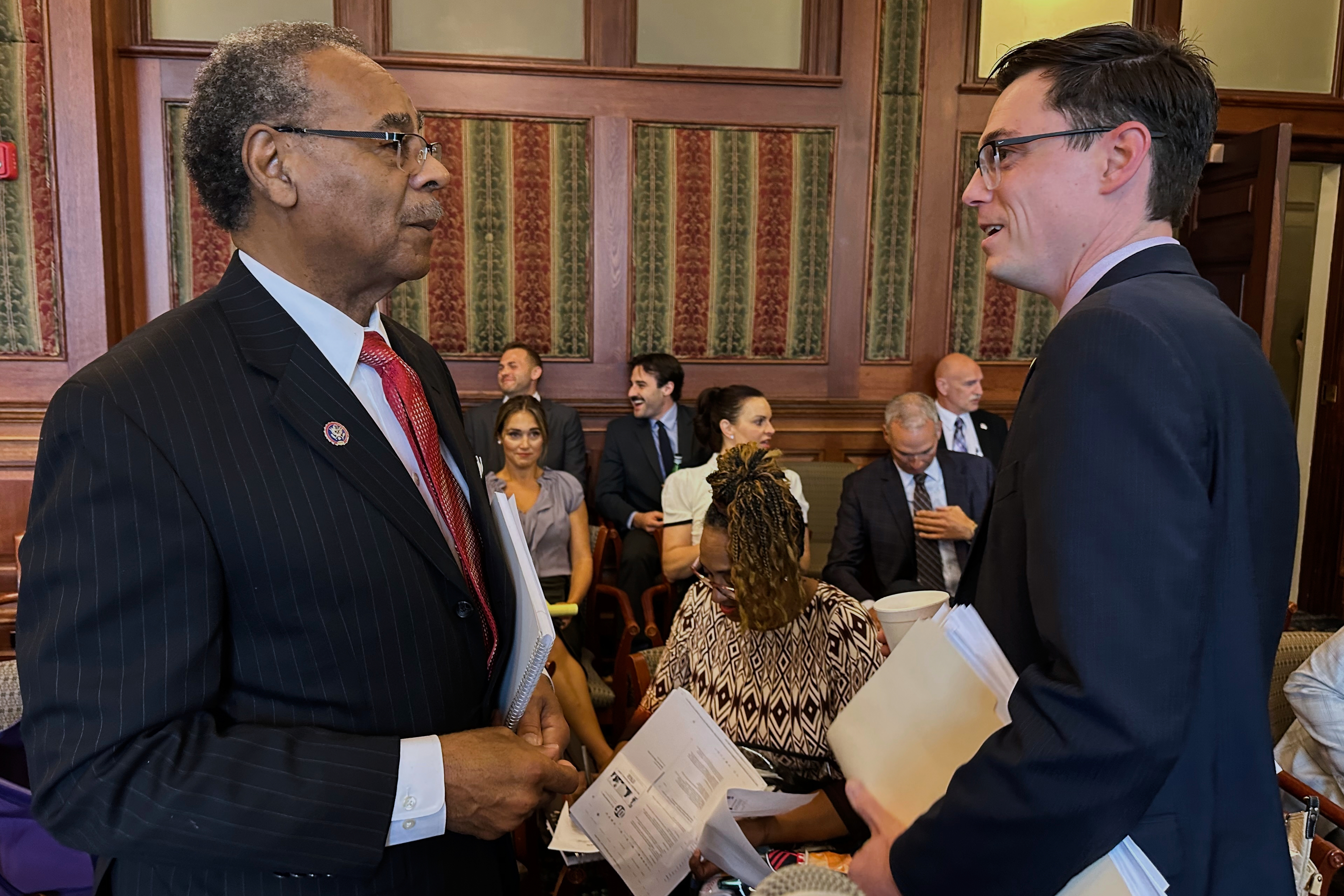 Democratic U.S. Rep. Emanuel Cleaver speaks to Missouri state Rep. Dirk Deaton, the Republican sponsor of a congressional redistricting plan, before testifying against it at a Missouri Senate hearing on Thursday, Sept. 11, 2025 in Jefferson City, Mo. (David A. Lieb - AP)