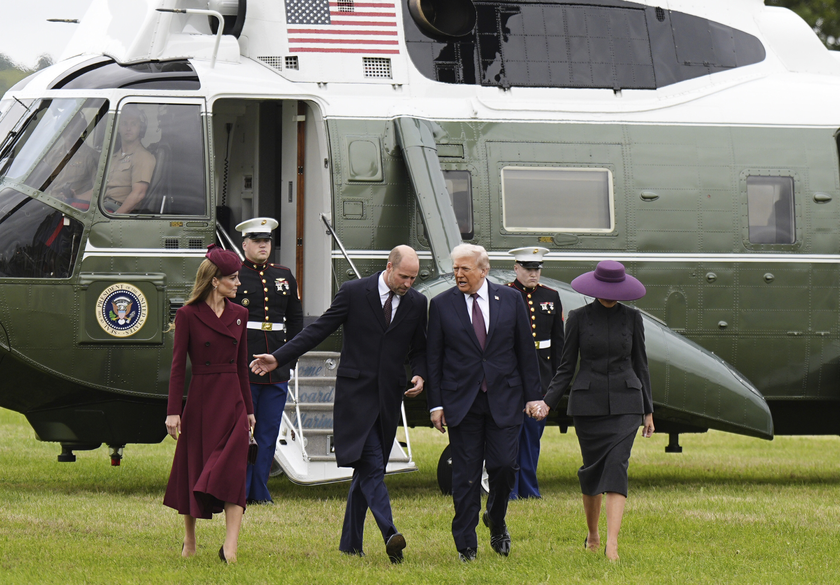 Britain's Prince William and Kate, Princess of Wales, left, receive President Donald Trump and first lady Melania Trump at Windsor Castle in Windsor, England, Wednesday Sept. 17, 2025. (Aaron Chown - Pool PA)