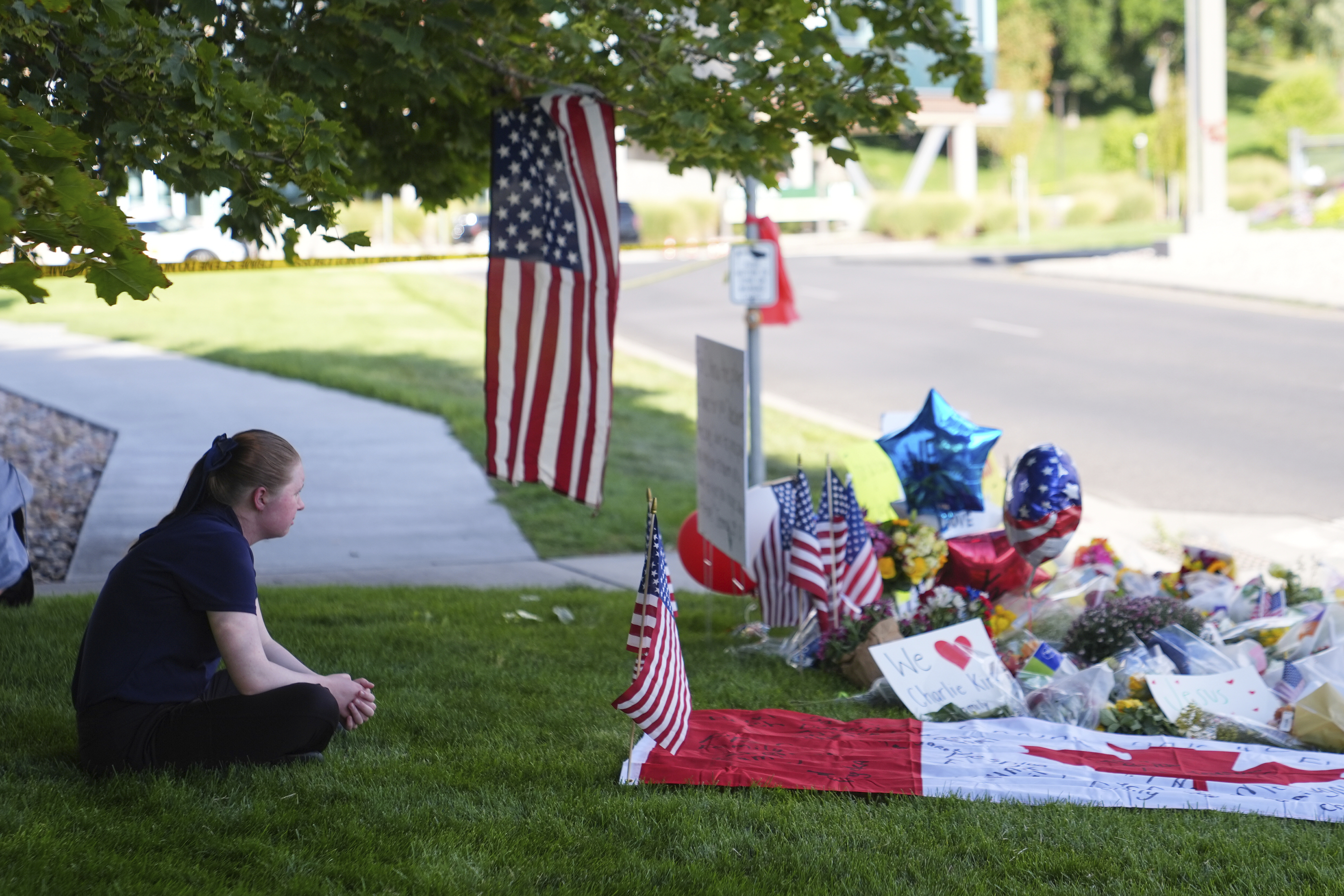 Alicia Daley sits at a memorial for Charlie Kirk on Friday, Sept. 12, 2025, in Orem, Utah. (Lindsey Wasson - AP)