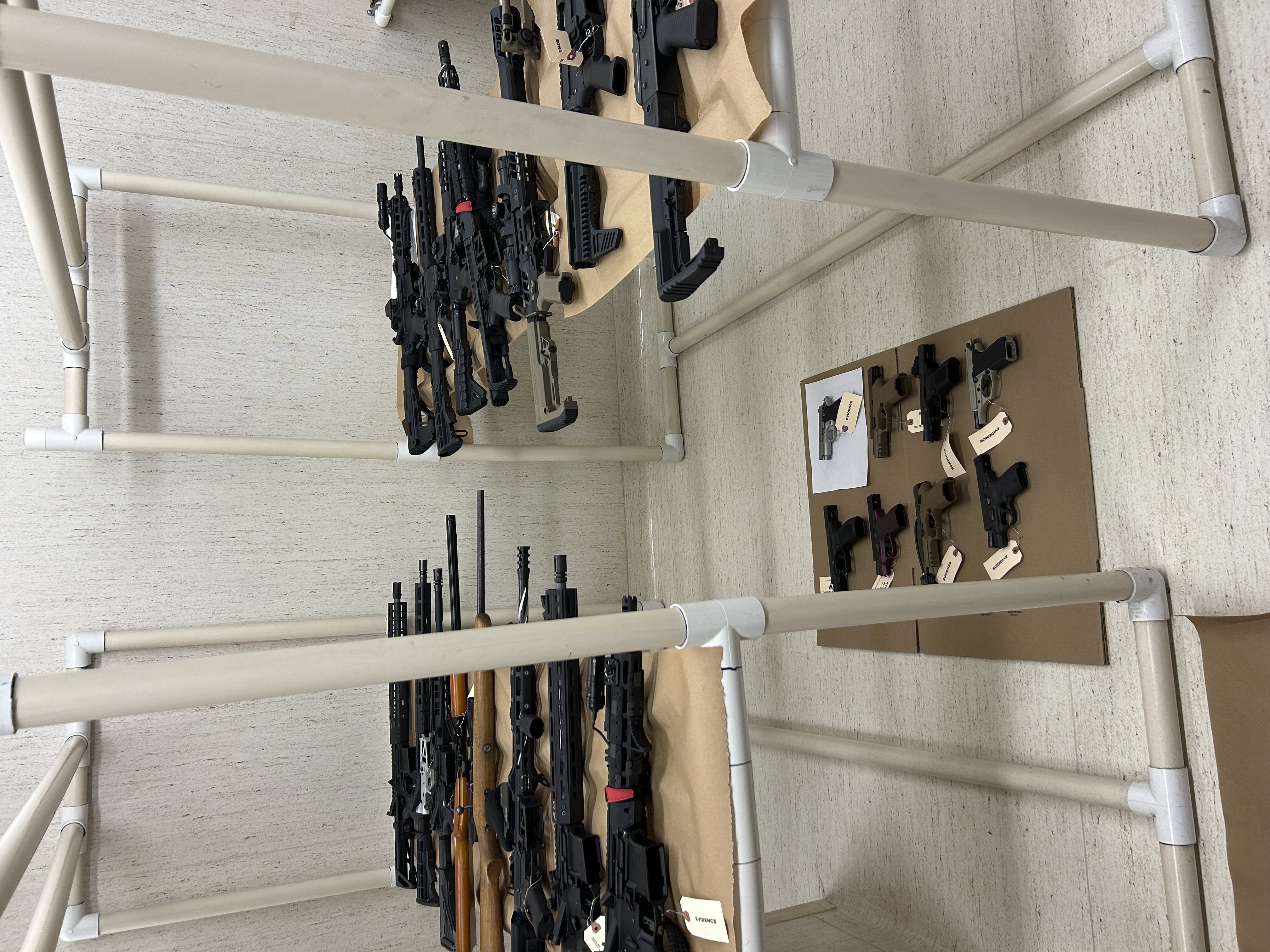 This image provided by Pierce County Sheriff's Office on Tuesday, Sept. 9, 2025 shows containers with weapons seized from the home of a 13-year-old boy in Pierce County, Wa., who authorities said had appeared to idolize school shooters. (Uncredited - Pierce County Sheriff's Office)