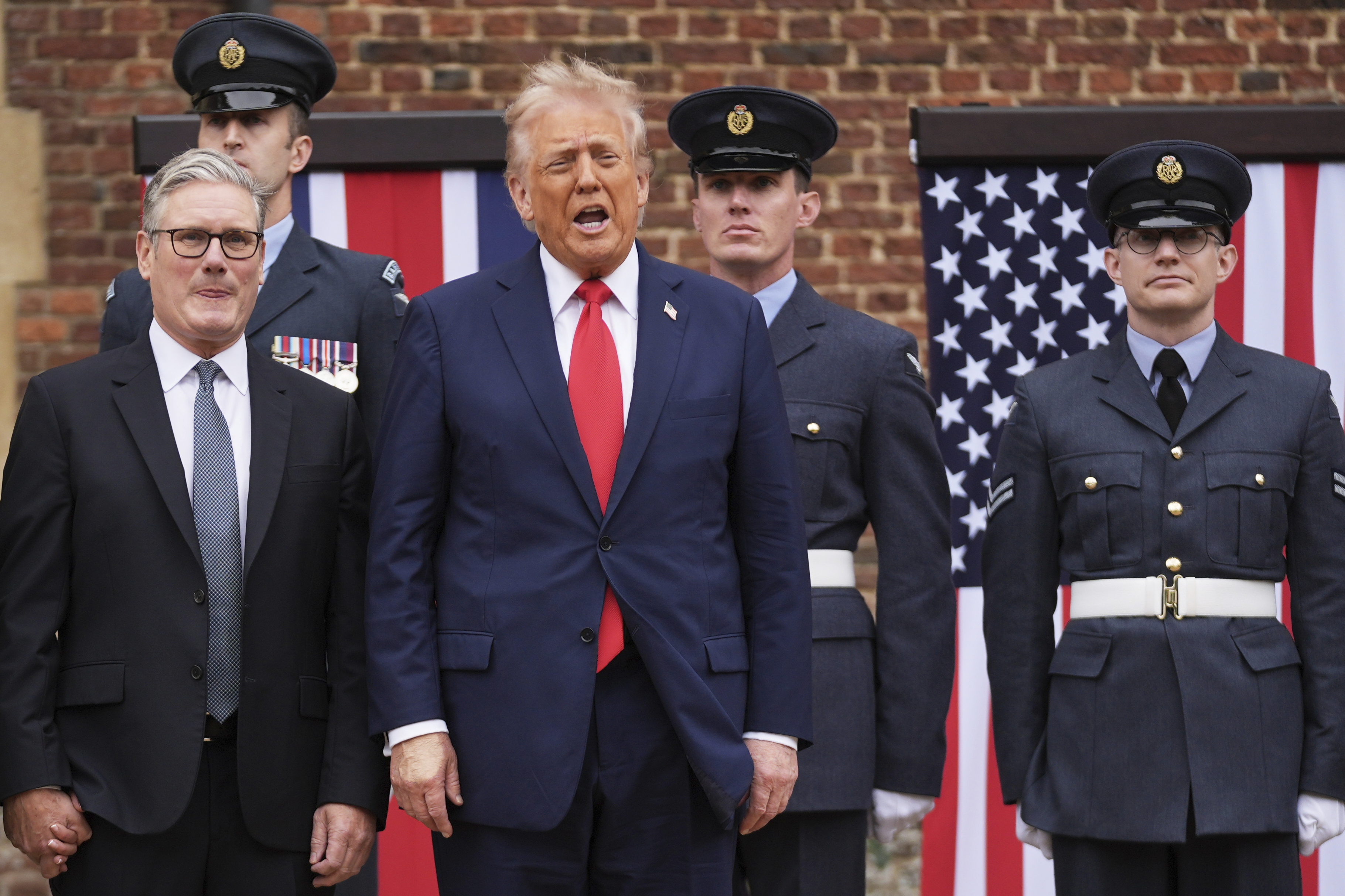 President Donald Trump reacts next to Britain's Prime Minister Keir Starmer upon arriving at Chequers near Aylesbury, England, Thursday, Sept. 18, 2025. (Evan Vucci - AP)