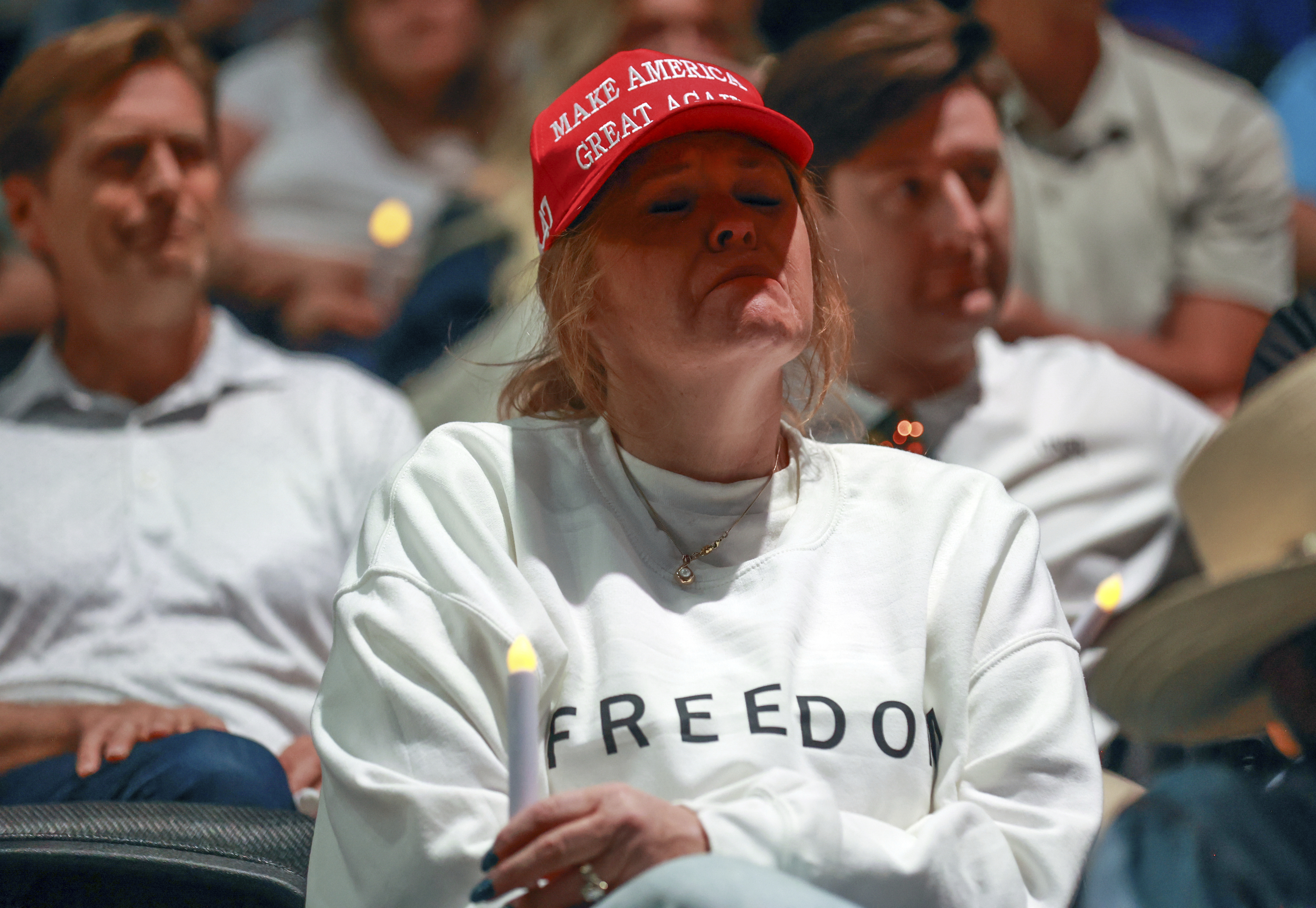 Tori Merrill gets emotional during a Vigil for Unity at the UCCU Center at Utah Valley University in Orem on Friday, Sept. 19, 2025. Charlie Kirk, conservative activist and the founder and president of Turning Point USA, was fatally shot while answering questions at his American Comeback Tour at UVU on Sept. 10. (Kristin Murphy - The Deseret News)