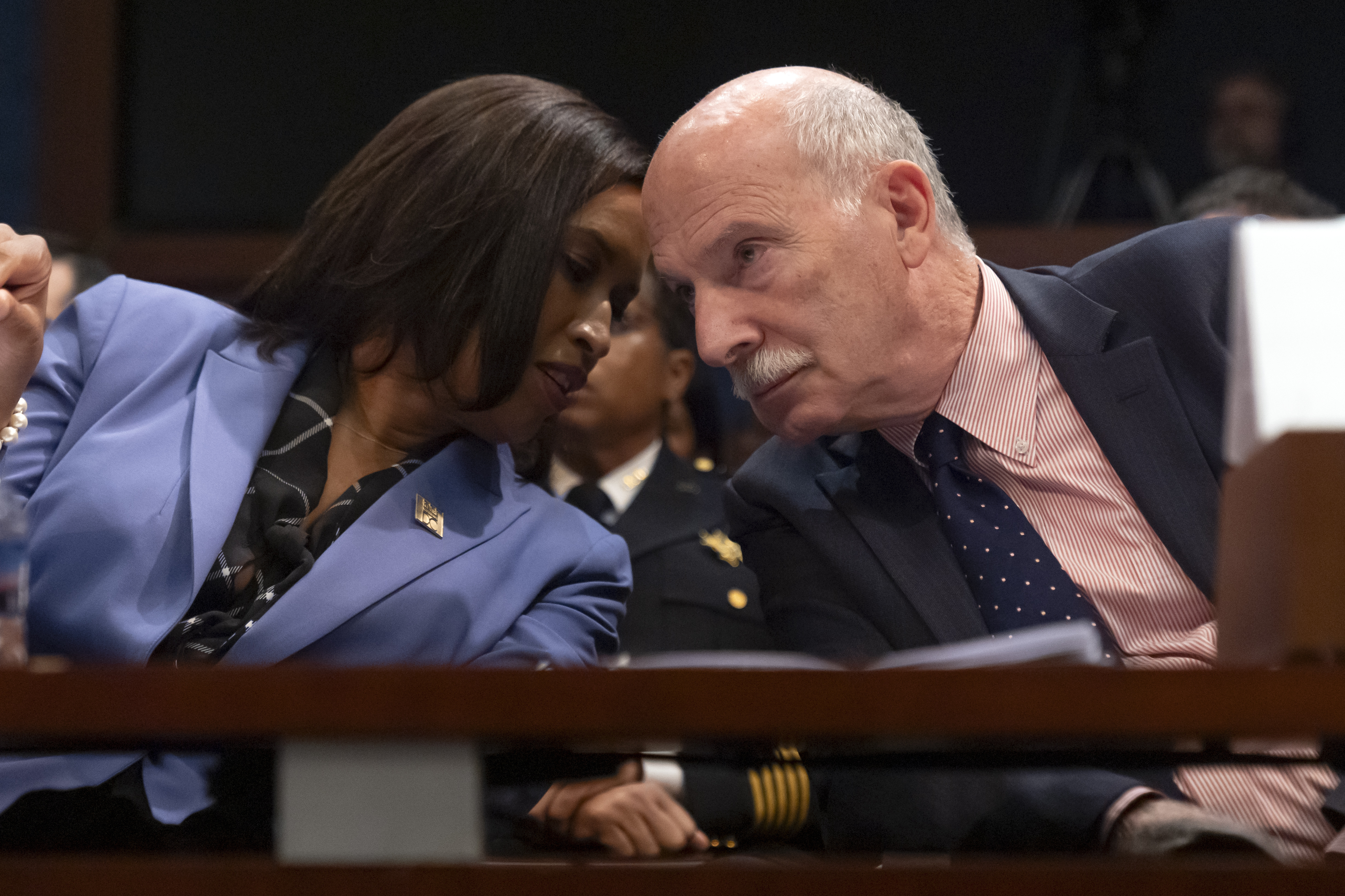 District of Columbia Mayor Muriel Bowser, left, and D.C. Council Chairman Phil Mendelson talk during a hearing of the House Committee on Oversight and Government Reform on Capitol Hill, Thursday, Sept. 18, 2025, in Washington. (Mark Schiefelbein - AP)