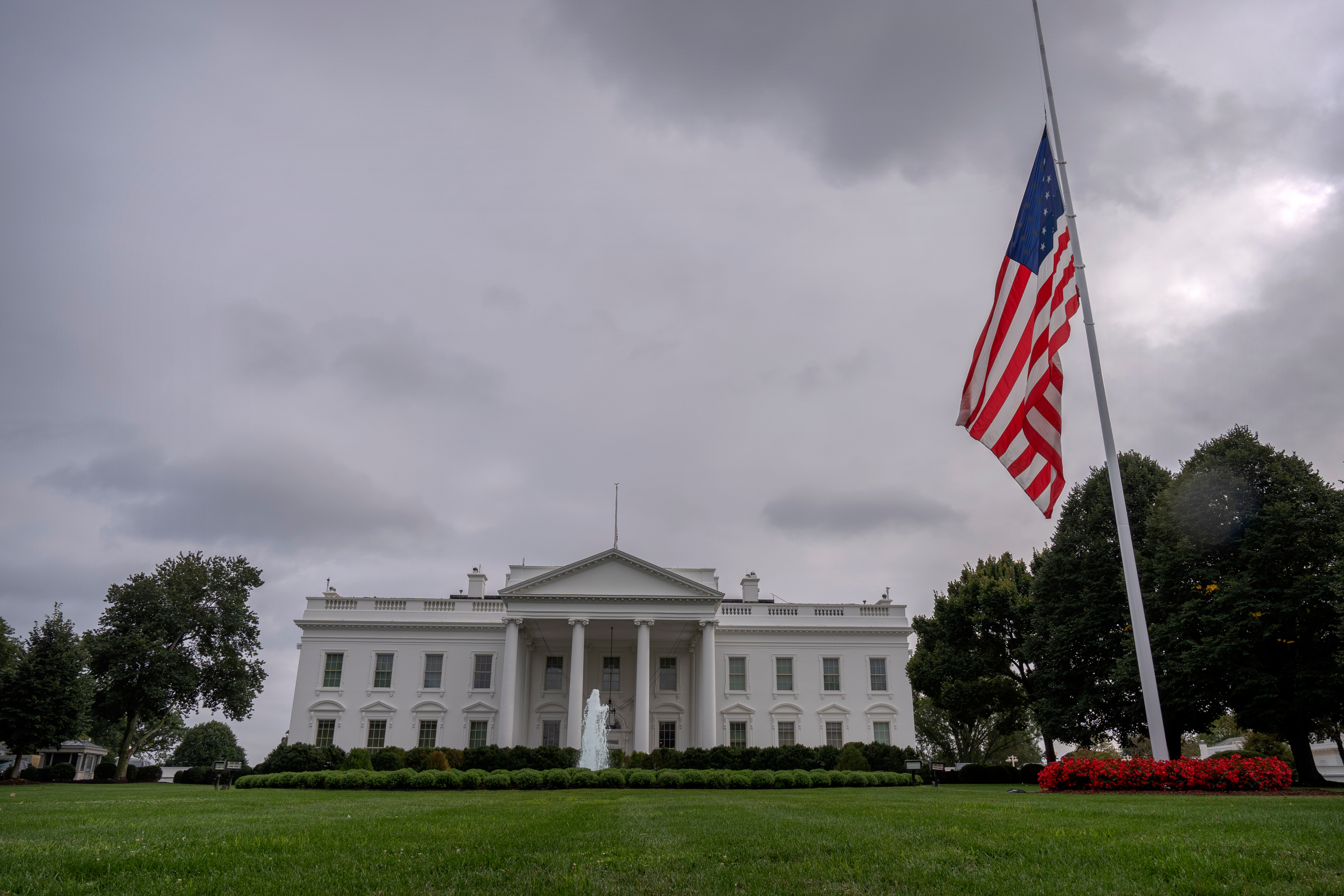 The American flag on the North Lawn at the White House in Washington, is lowered to half-staff after Charlie Kirk, the CEO and co-founder of Turning Point USA, was killed at an event in Orem, Utah, Wednesday, Sept. 10, 2025. (Mark Schiefelbein - AP)