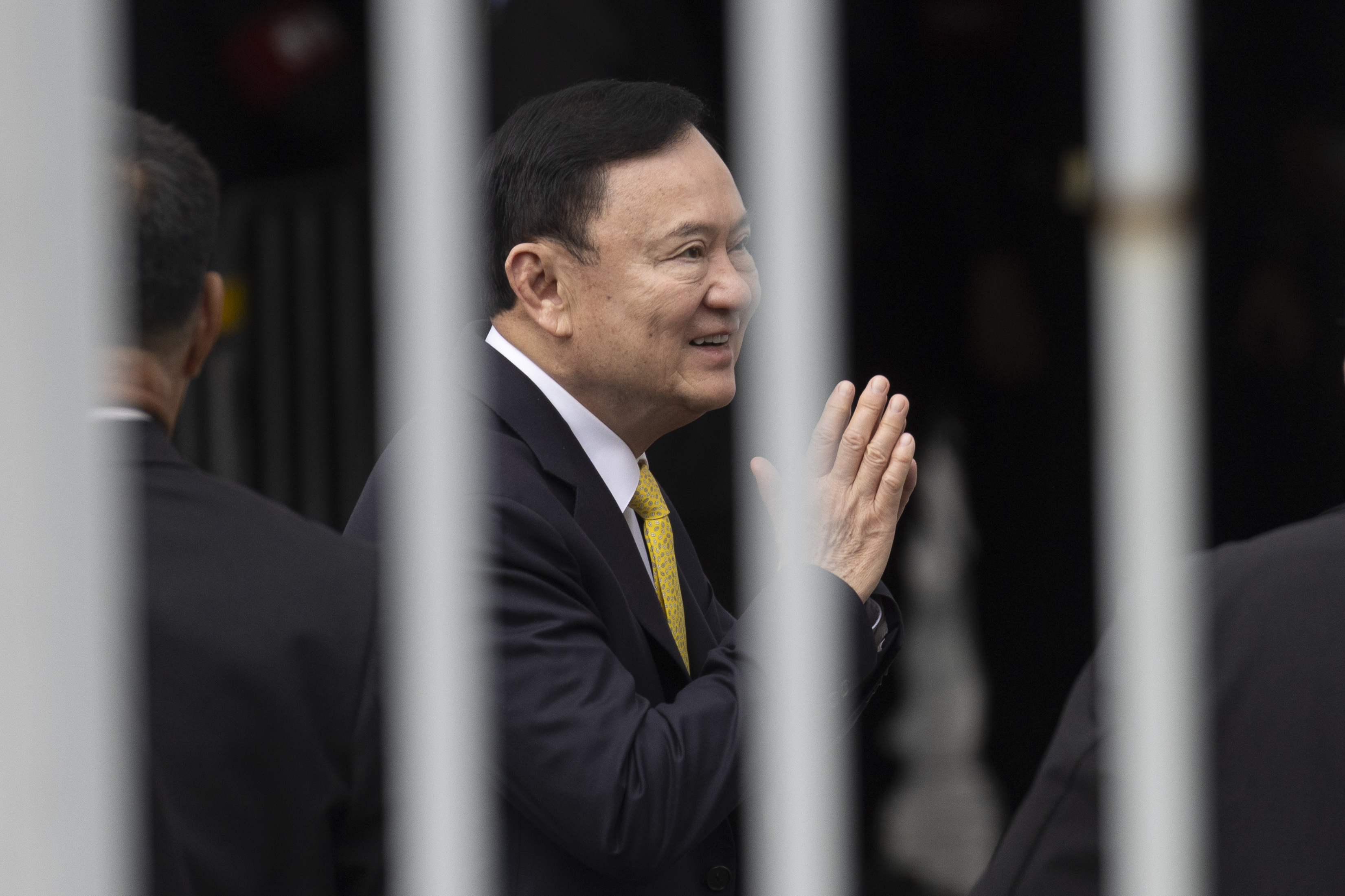 Thailand's former Prime Minister Thaksin Shinawatra arrives at the Supreme Court in Bangkok, Thailand, Tuesday, Sept. 9, 2025. (Wason Wanichakorn - AP)