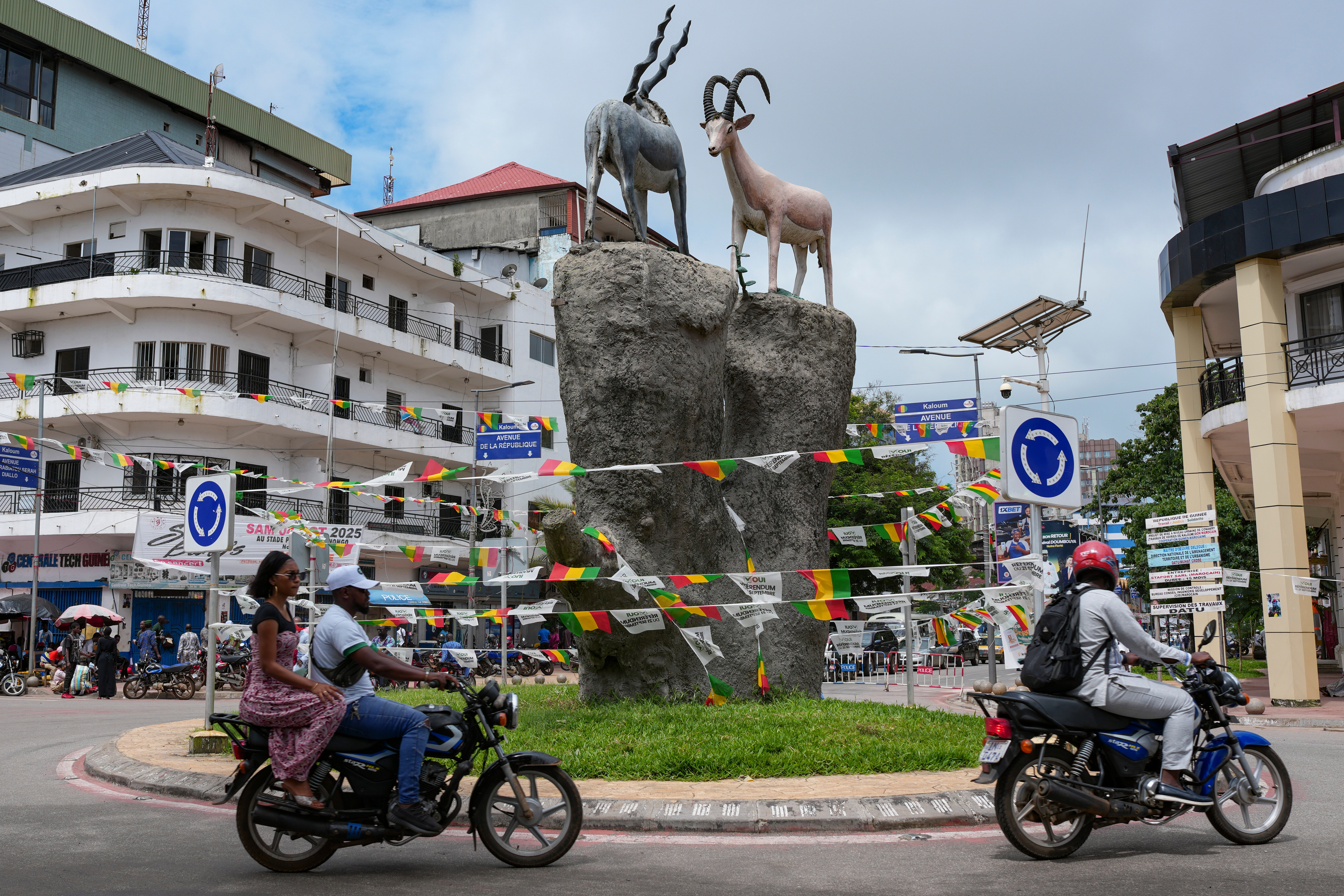 Guinea counts votes in a referendum that could allow junta leader to run for president